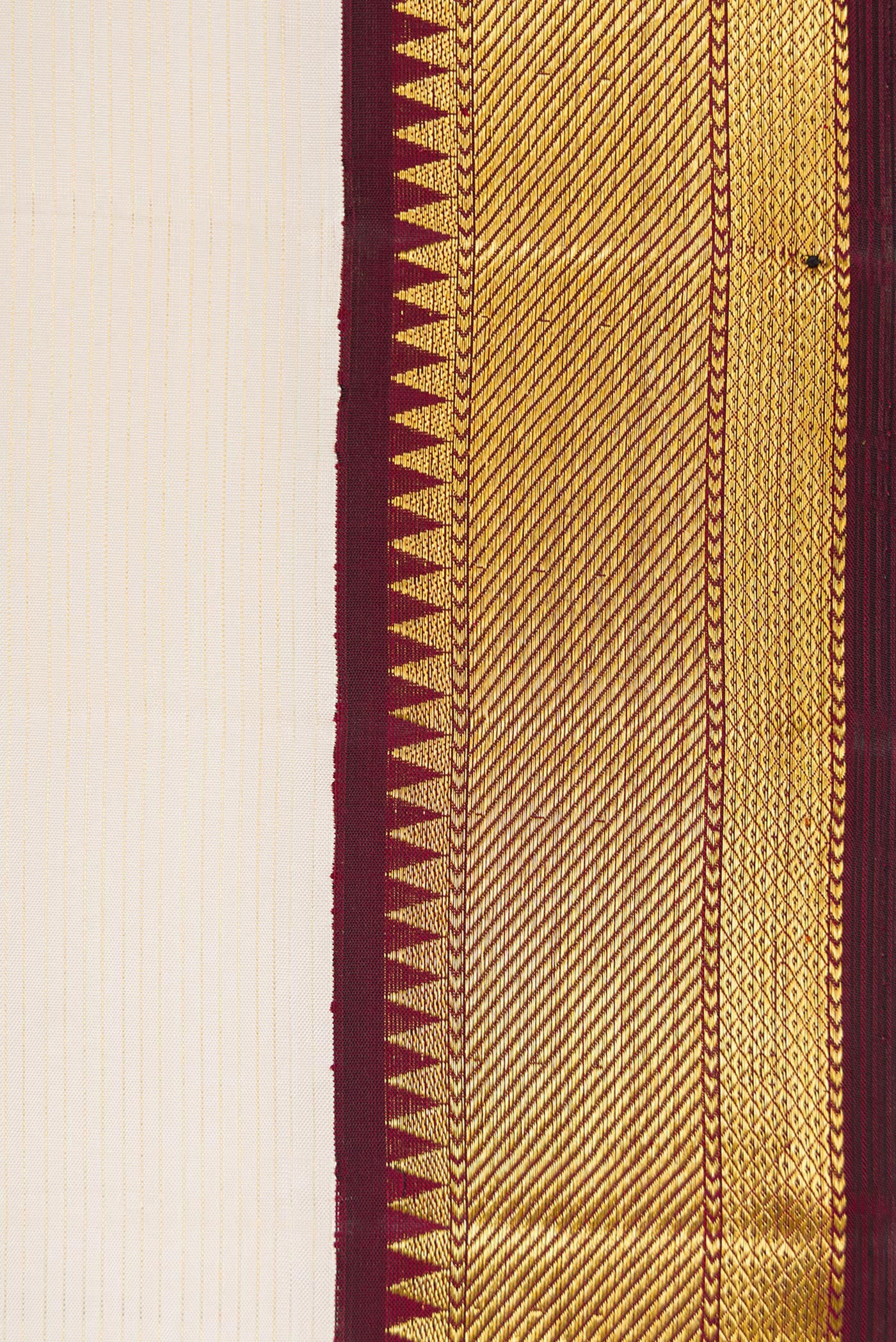Border image of Pure Silk Pure Zari Off White Dual Tone Kanchipuram Saree with Stripes on the body and Zari Border. 