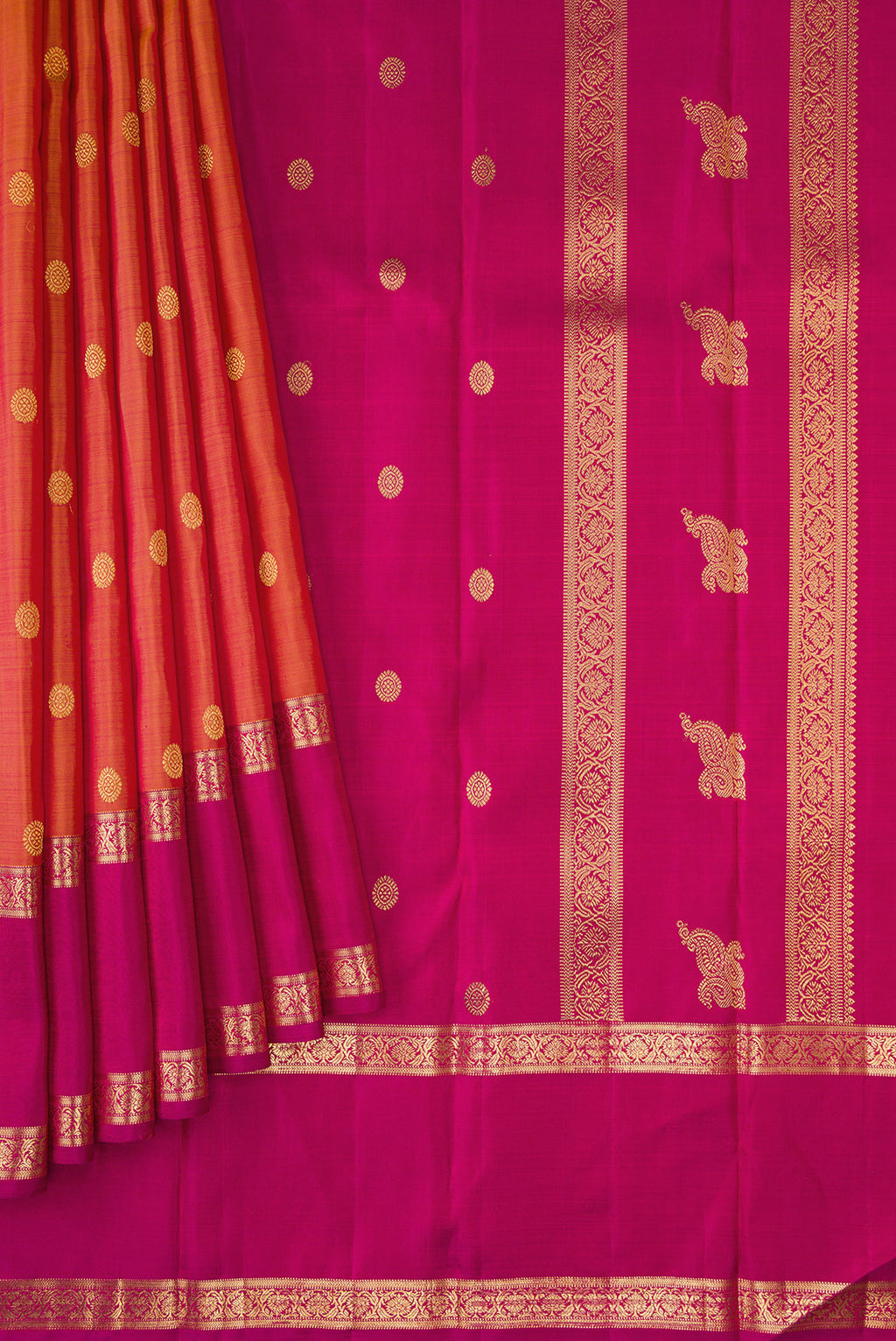 Pleats and pallu of Pure Silk Pure Zari Brick Orange Dual Tone Kanjivaram Saree with Zari Butta on the body and Zari Border. 