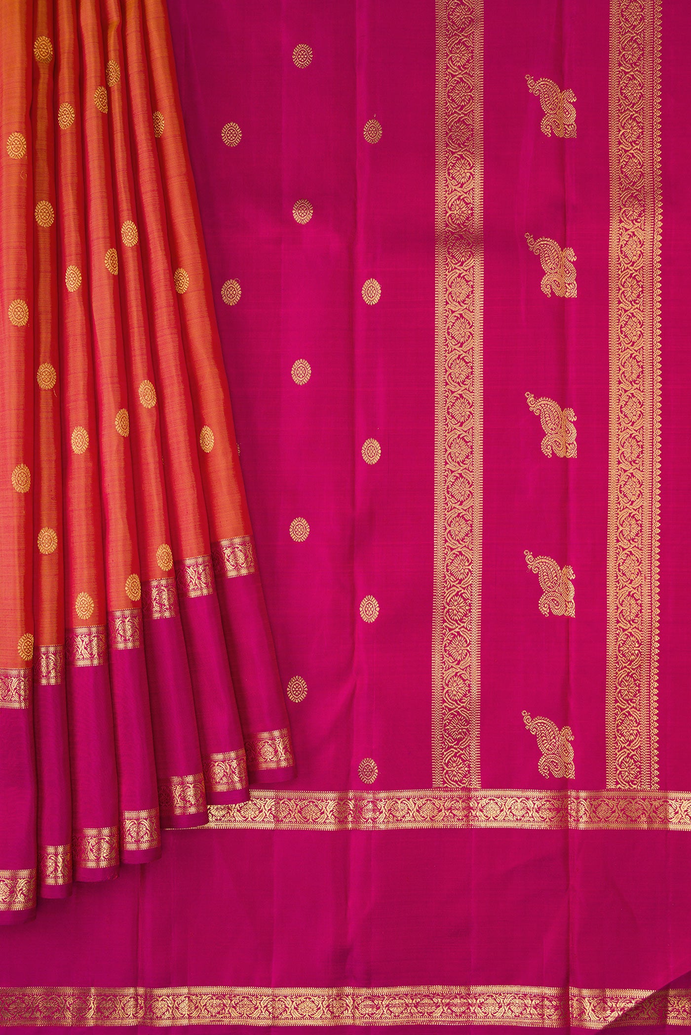 Pleats and pallu of Pure Silk Pure Zari Brick Orange Dual Tone Kanjivaram Saree with Zari Butta on the body and Zari Border. 