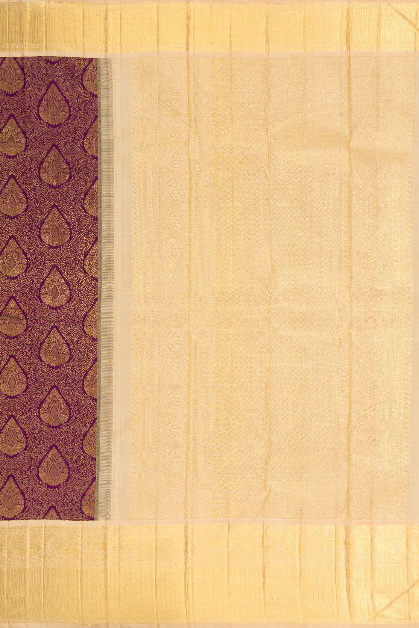 Close up image of the pallu of Pure Silk Pure Zari Purple Dual Tone Kanjivaram Saree with Zari Brocade on the body and Zari Border. 
