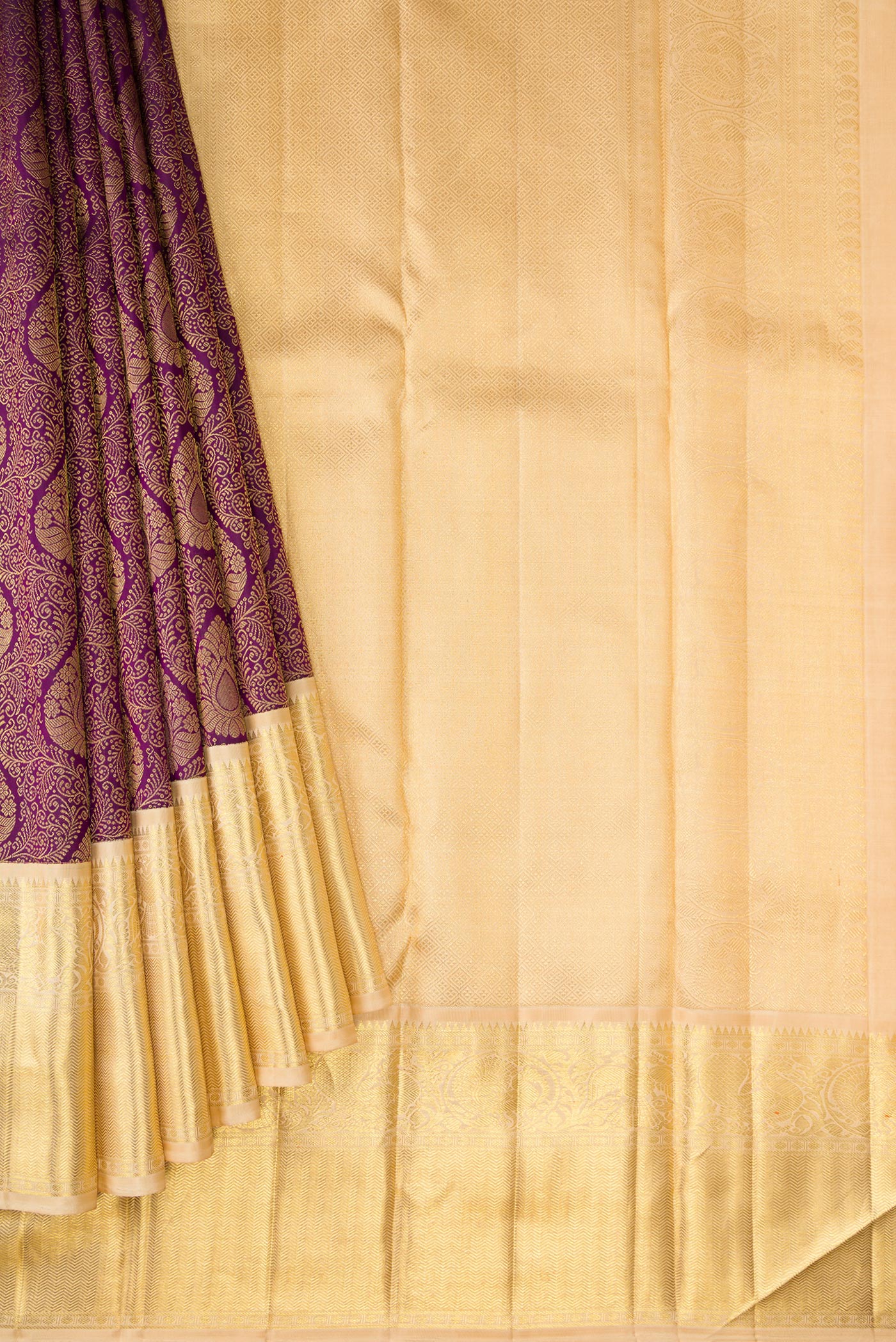 Pleats and pallu of Pure Silk Pure Zari Purple Dual Tone Kanjivaram Saree with Zari Brocade on the body and Zari Border. 