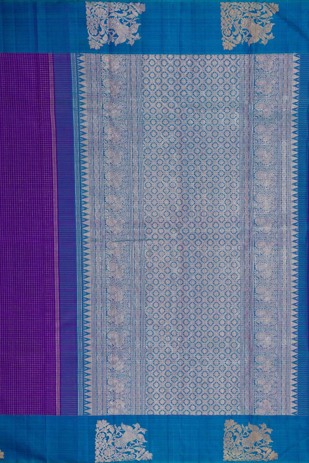 Close up image of the pallu of Violet Dual Tone Kanjivaram Silk Saree with Checked design on the body and Fancy Border. 