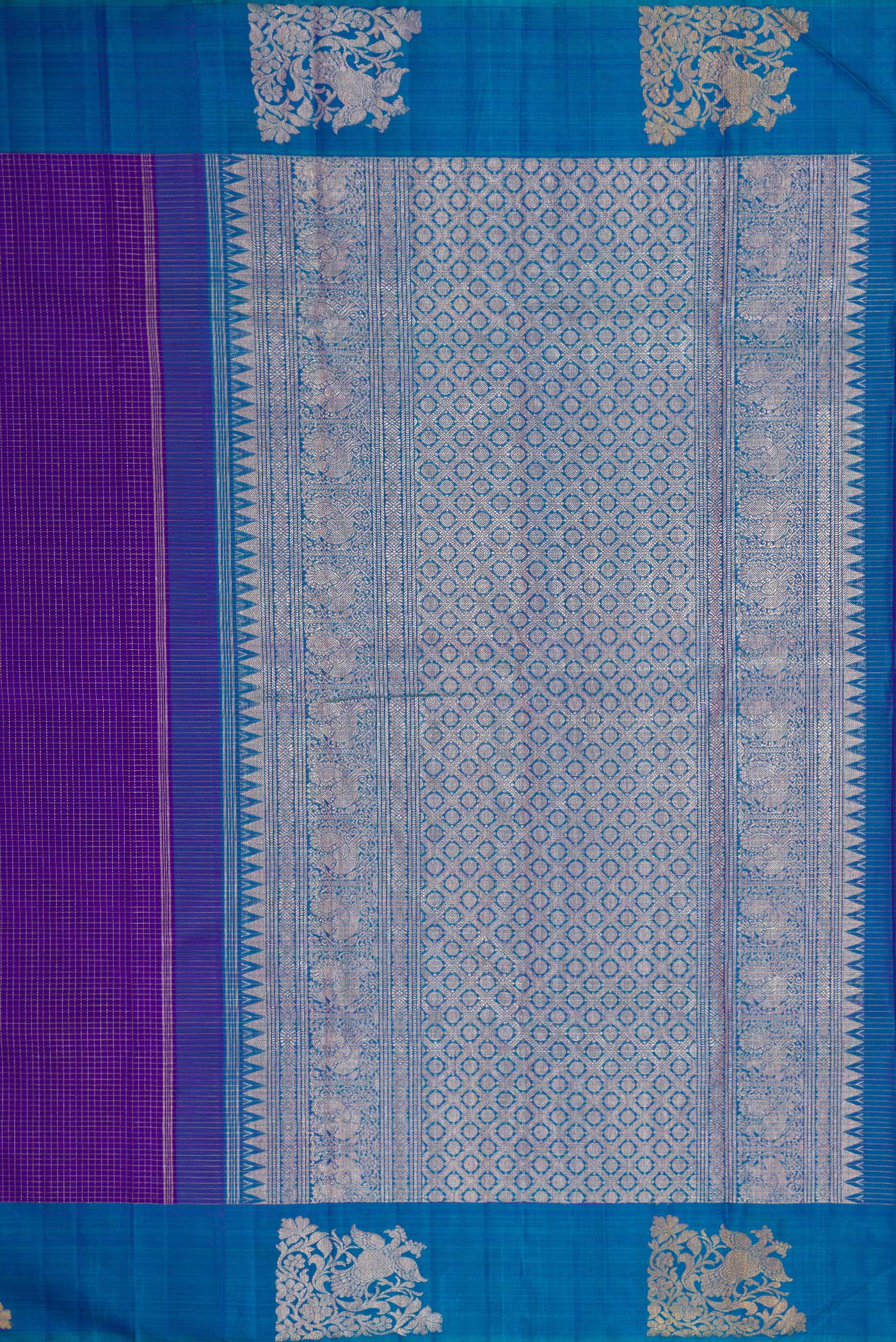 Close up image of the pallu of Violet Dual Tone Kanjivaram Silk Saree with Checked design on the body and Fancy Border. 