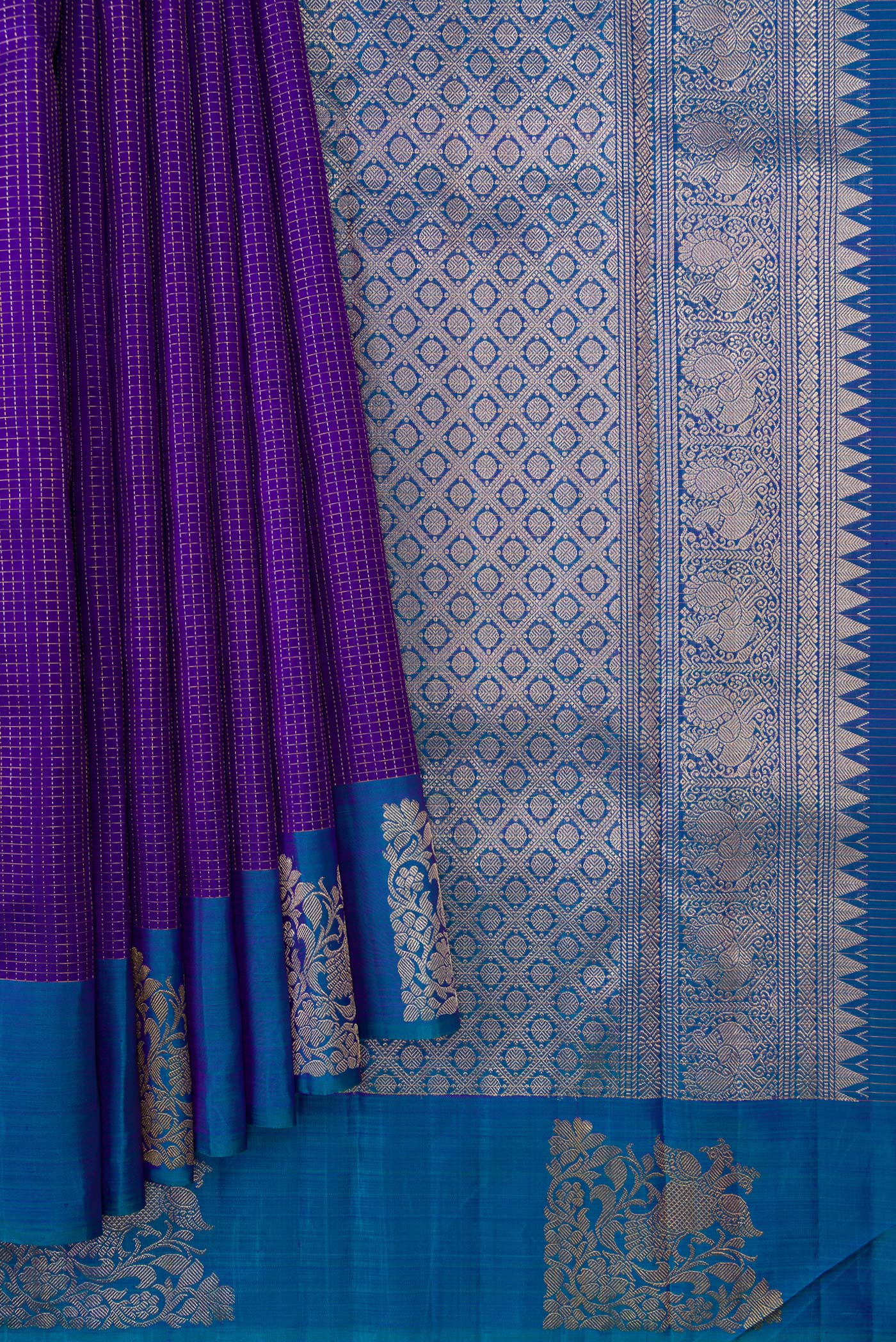 Pleats and pallu of Violet Dual Tone Kanjivaram Silk Saree with Checked design on the body and Fancy Border. 