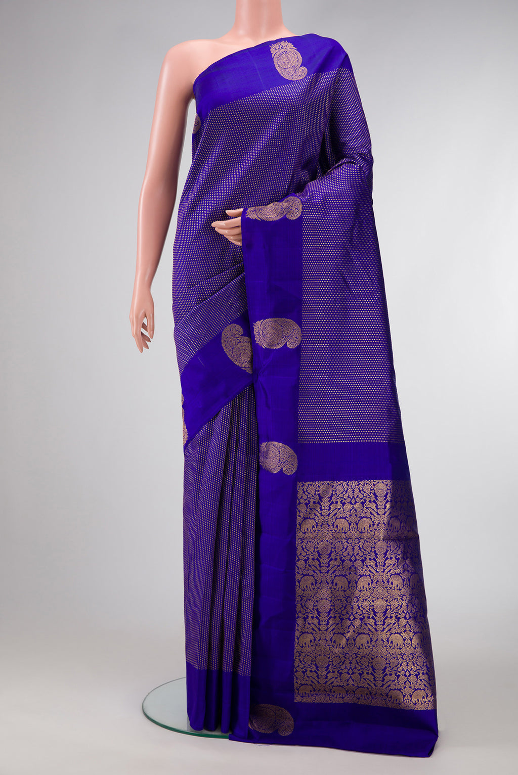 Royal Blue Dual Tone Kanjivaram Silk Saree with Stripes on the body and Fancy Border.  displayed on a mannequin