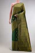Green Dual Tone Kanchipuram Silk Saree with Zari Butta on the body and Zari Border.  displayed on a mannequin