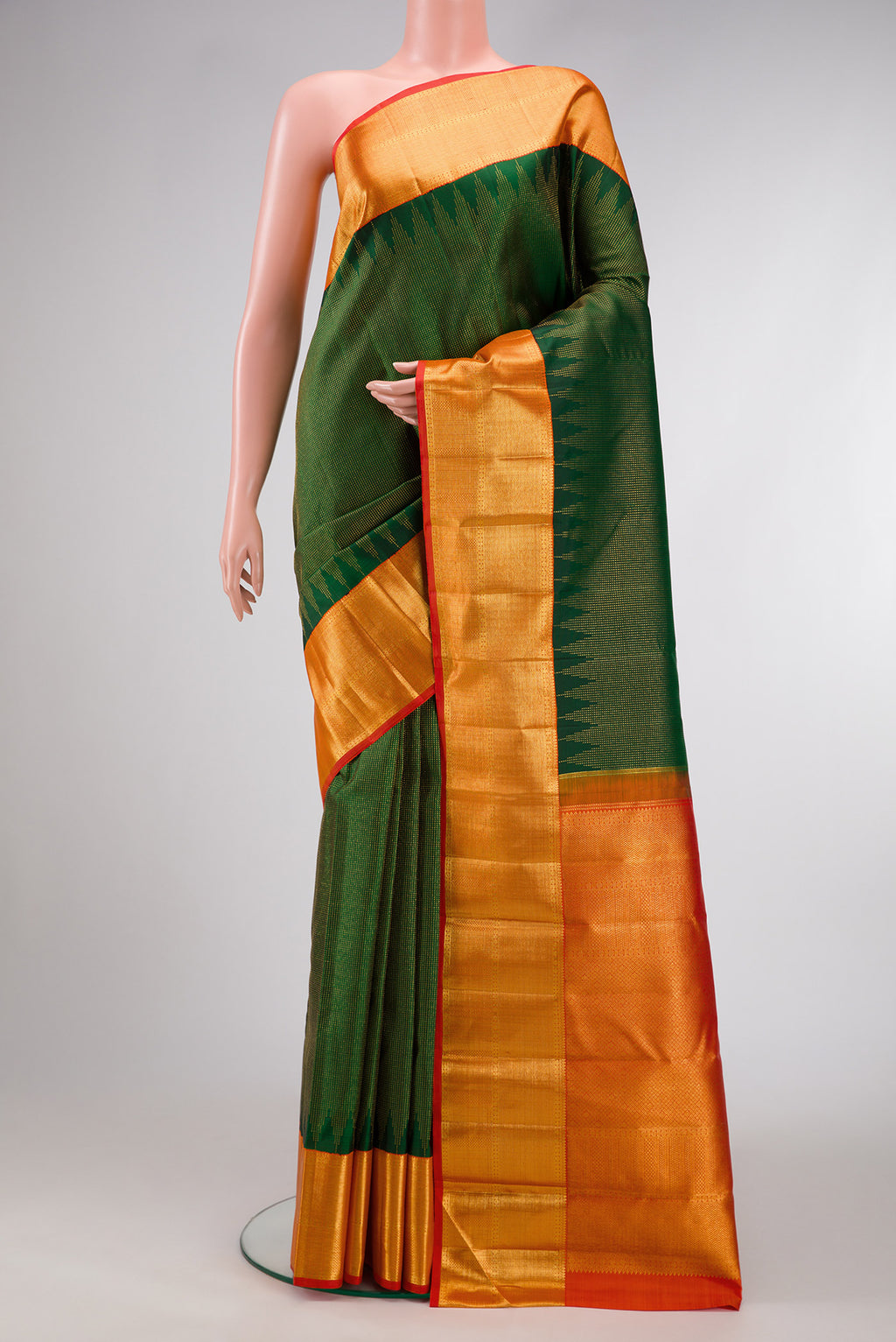 Green Dual Tone Kanchipuram Silk Saree with Stripes on the body and Zari Border.  displayed on a mannequin