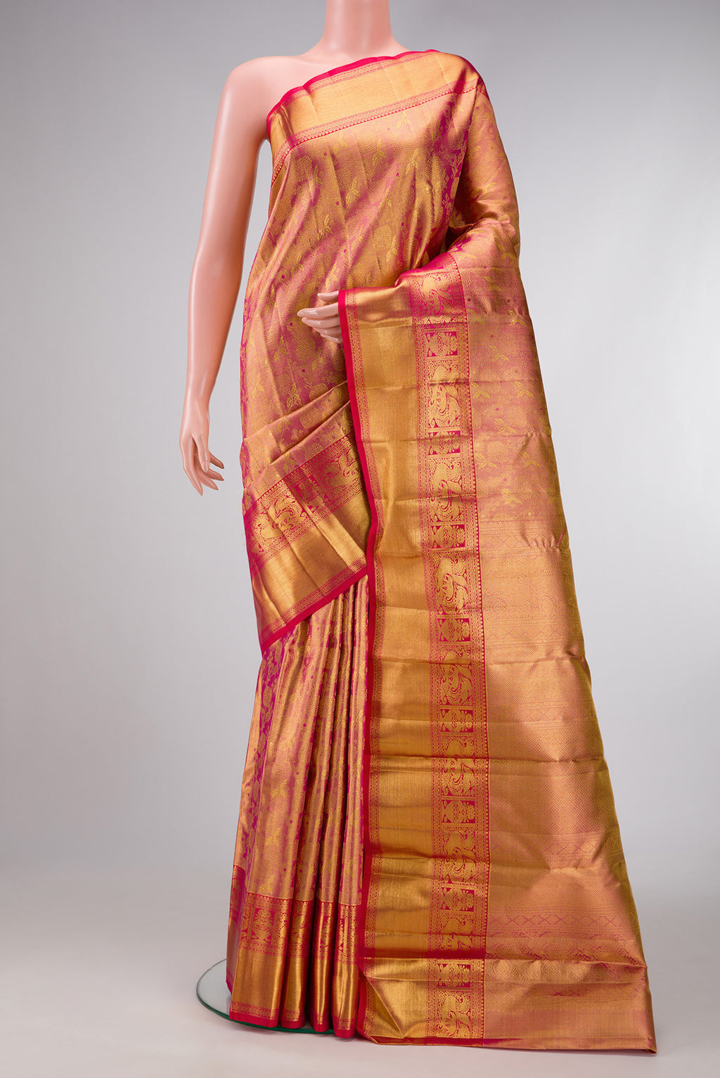 Rose Gold Dual Tone Kanchipuram Tissue Silk Saree with Zari Brocade on the body and Zari Border.  displayed on a mannequin