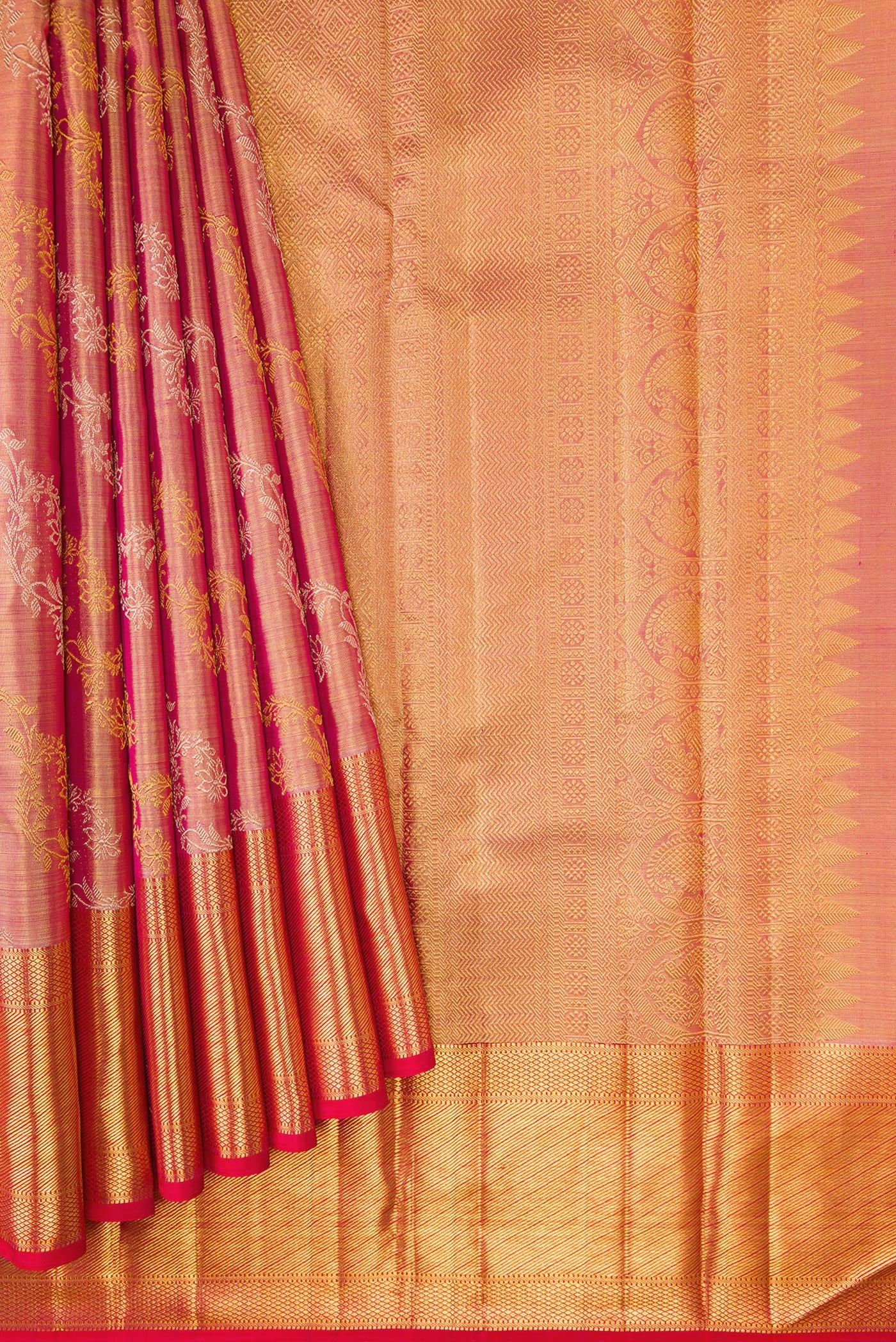 Pleats and pallu of Rose Gold Dual Tone Kanjivaram Tissue Silk Saree with Zari Brocade on the body and Zari Border. 
