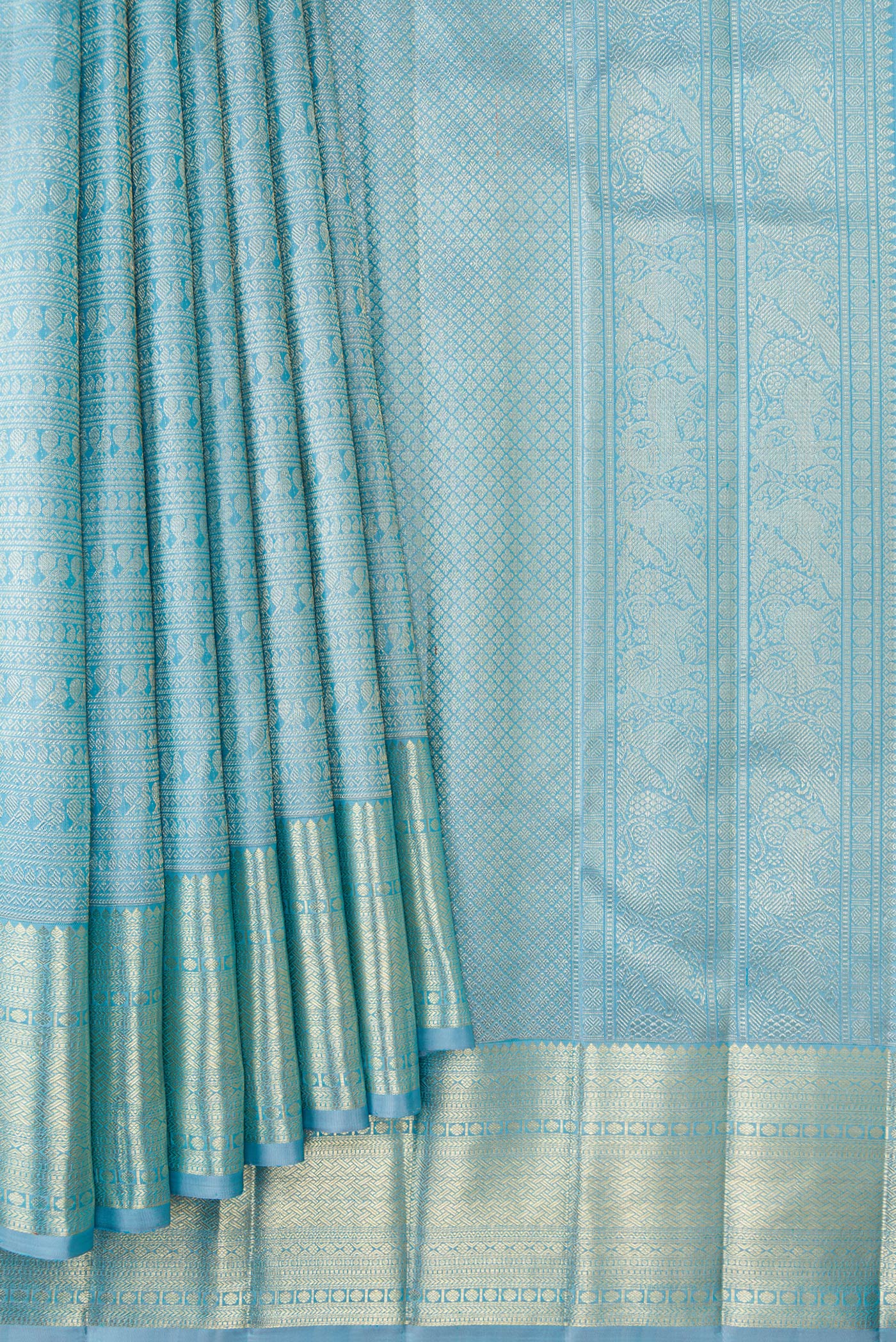 Pleats and pallu of Sky Blue Dual Tone Kanchipuram Silk Saree with Zari Brocade on the body and Zari Border. 