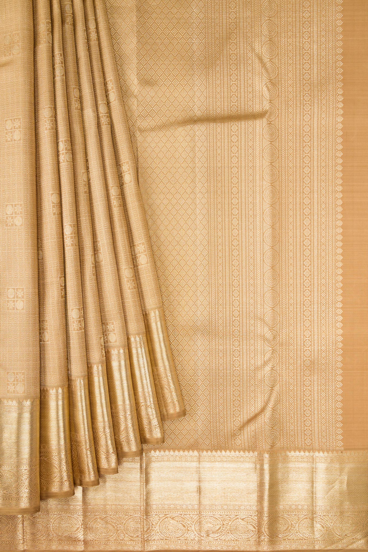 Pleats and pallu of Dark Beige Dual Tone Kanchipuram Silk Saree with Zari Brocade on the body and Zari Border. 
