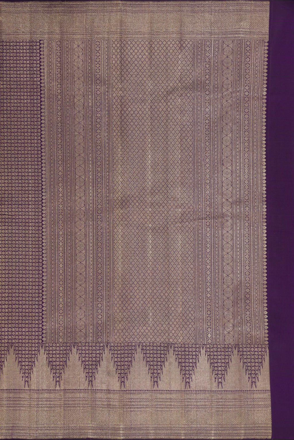 Close up image of the pallu of Violet Dual Tone Kanchipuram Silk Saree with Zari Brocade on the body and Zari Border. 