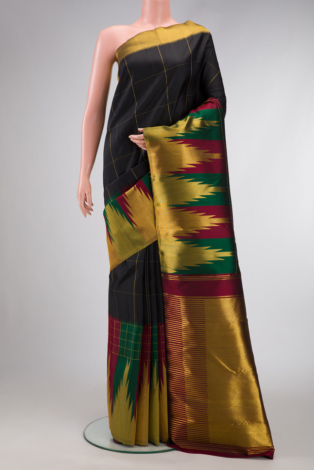 Black Dual Tone Kanchipuram Silk Saree with Checked design on the body and Fancy Border.  displayed on a mannequin