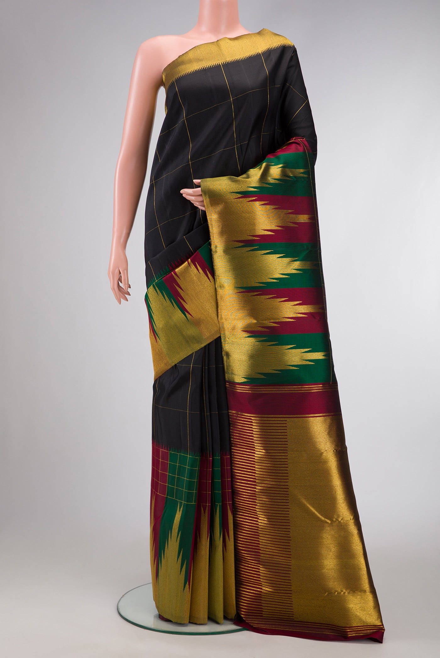 Black Dual Tone Kanchipuram Silk Saree with Checked design on the body and Fancy Border.  displayed on a mannequin