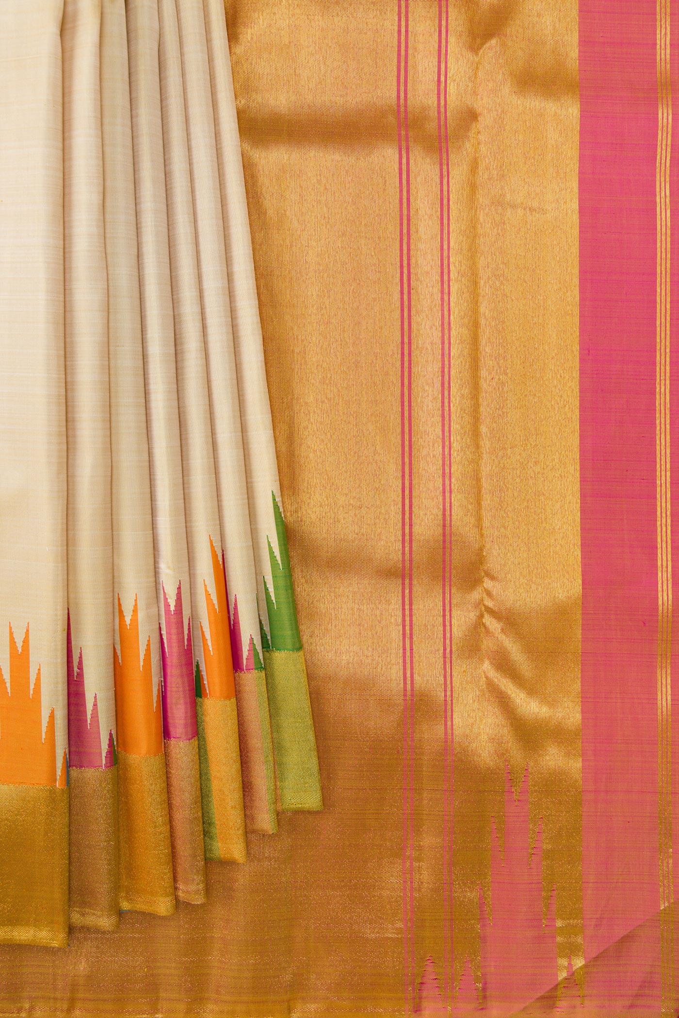 Pleats and pallu of Beige Dual Tone Kanjivaram Silk Saree with Plain Body and Temple Border. 