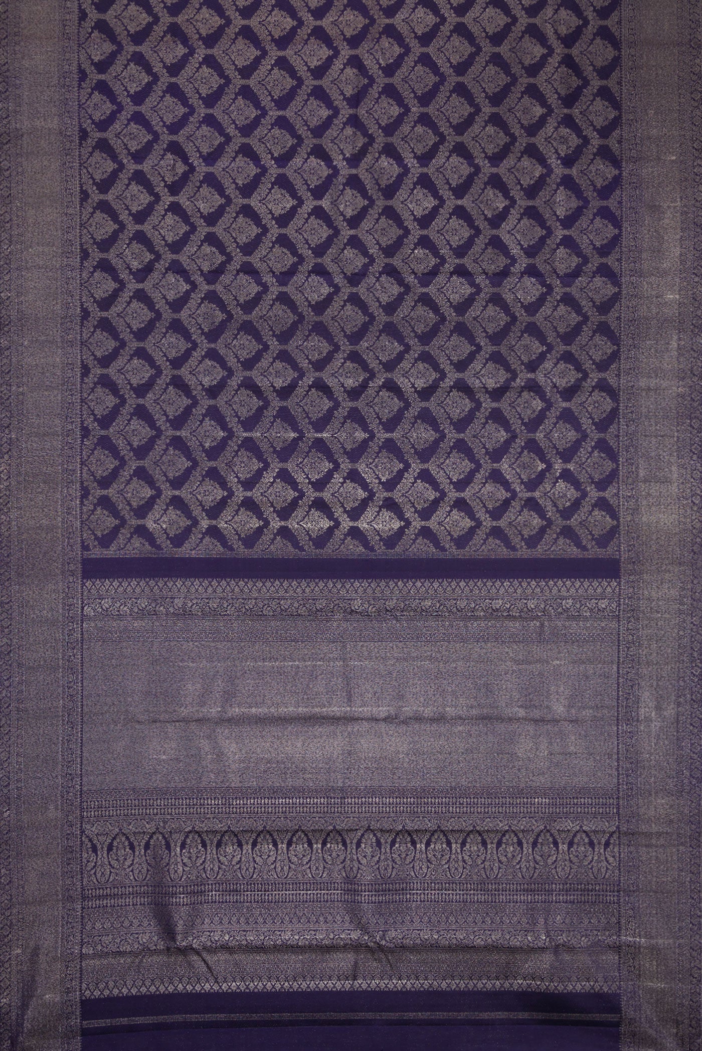 Flat view of Navy Blue Dual Tone Kanjivaram Silk Saree with Zari Brocade on the body and Zari Border. 