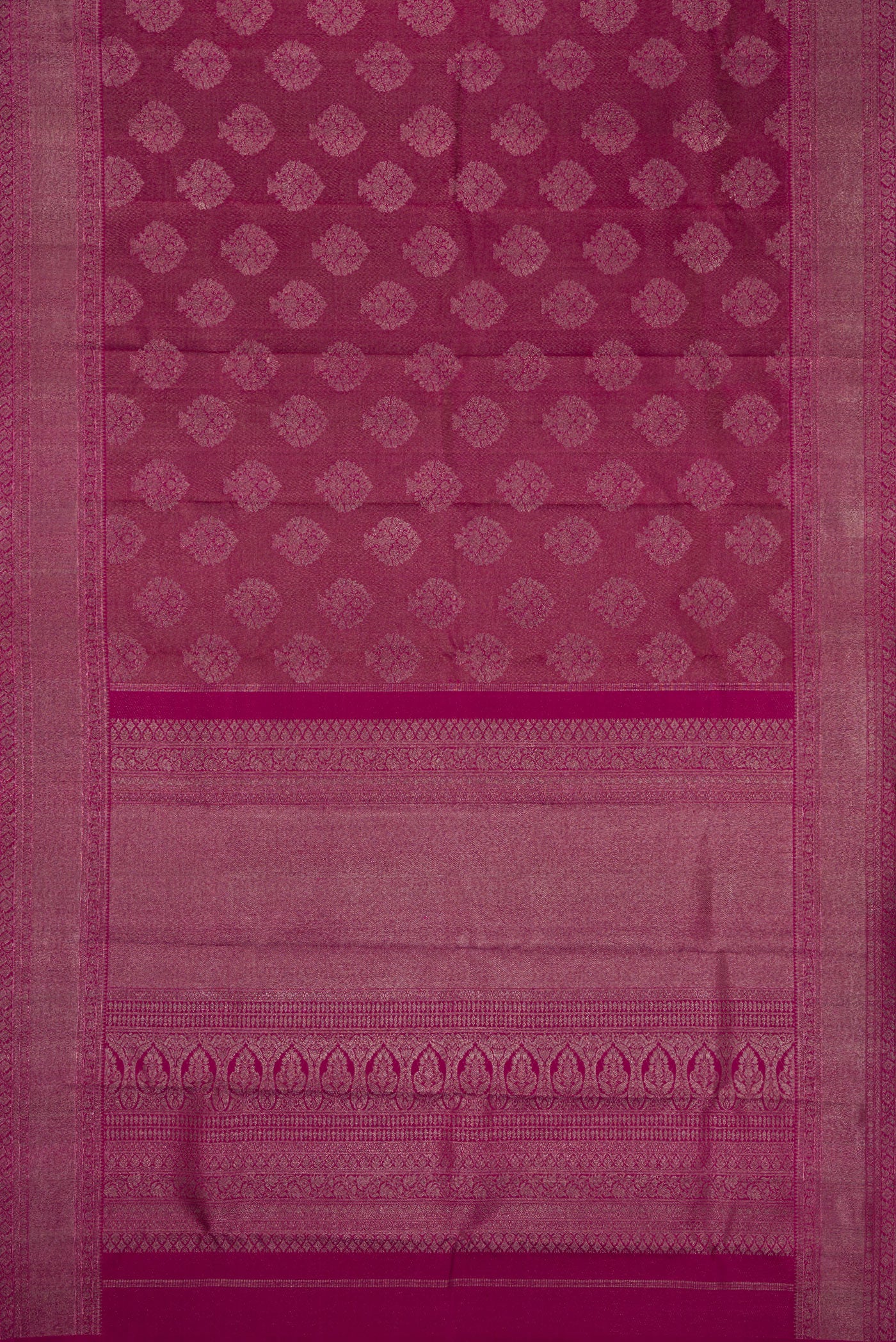 Flat view of Magenta Dual Tone Kanjivaram Silk Saree with Zari Brocade on the body and Zari Border. 
