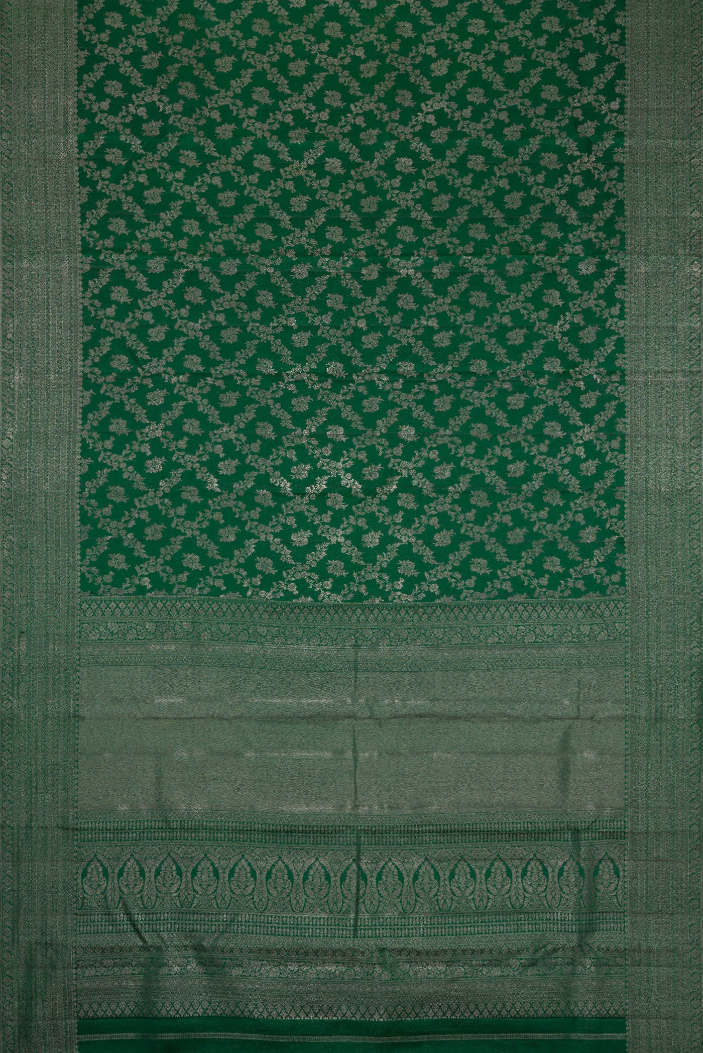 Flat view of Bottle Green Dual Tone Kanjivaram Silk Saree with Zari Brocade on the body and Zari Border. 