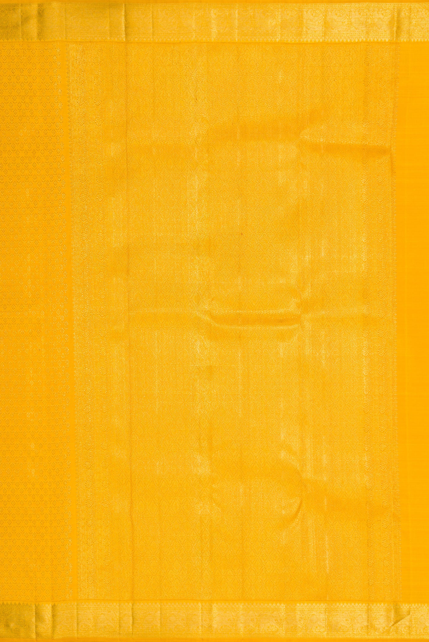 Close up image of the pallu of Yellow Dual Tone Kanchipuram Silk Saree with Zari Brocade on the body and Zari Border. 