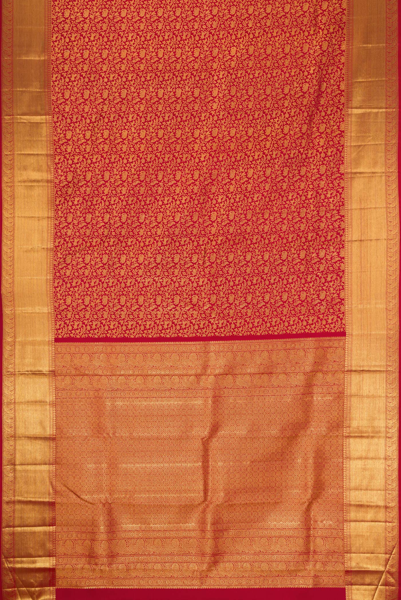 Flat view of Maroon Dual Tone Kanchipuram Silk Saree with Zari Brocade on the body and Zari Border. 