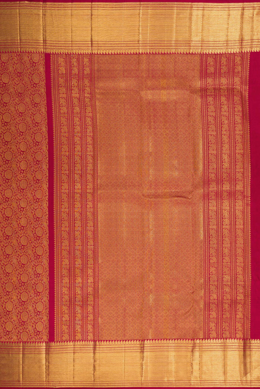 Close up image of the pallu of Maroon Dual Tone Kanchipuram Silk Saree with Zari Brocade on the body and Zari Border. 