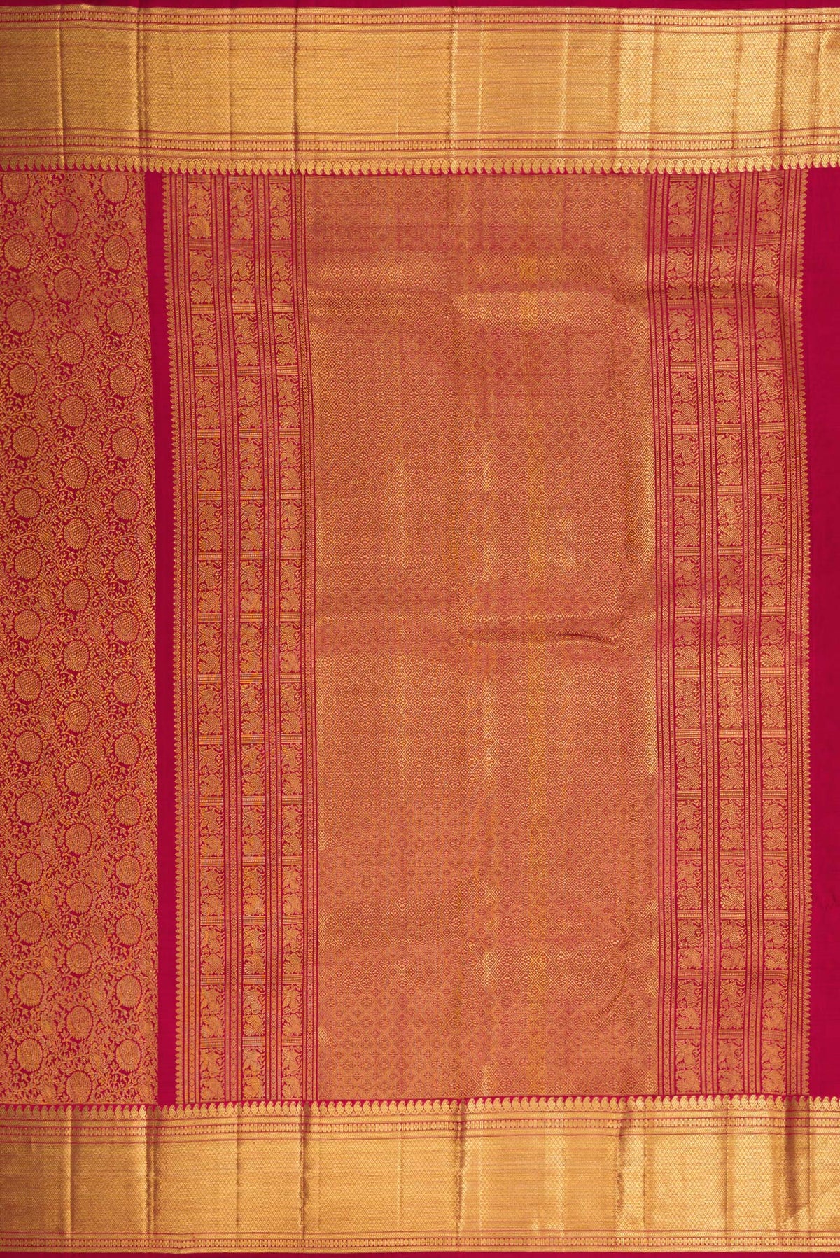Close up image of the pallu of Maroon Dual Tone Kanchipuram Silk Saree with Zari Brocade on the body and Zari Border. 