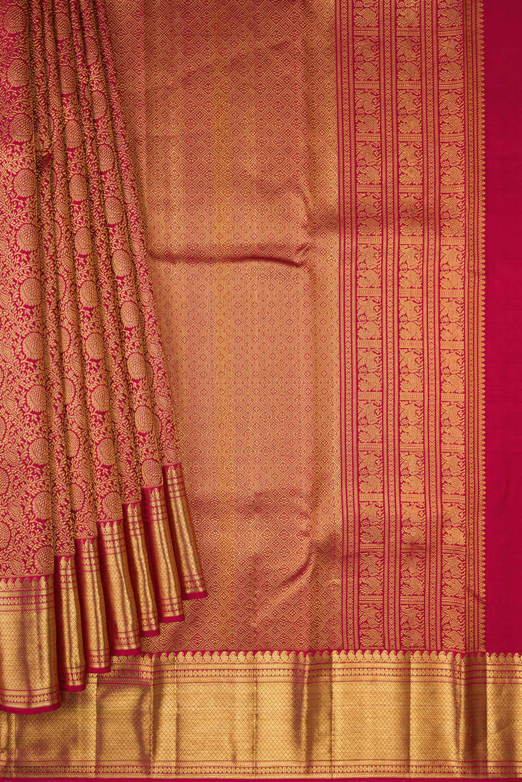 Pleats and pallu of Maroon Dual Tone Kanchipuram Silk Saree with Zari Brocade on the body and Zari Border. 