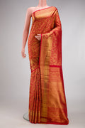 Red Kanchipuram Silk Saree with Zari Brocade on the body and Zari Border.  displayed on a mannequin