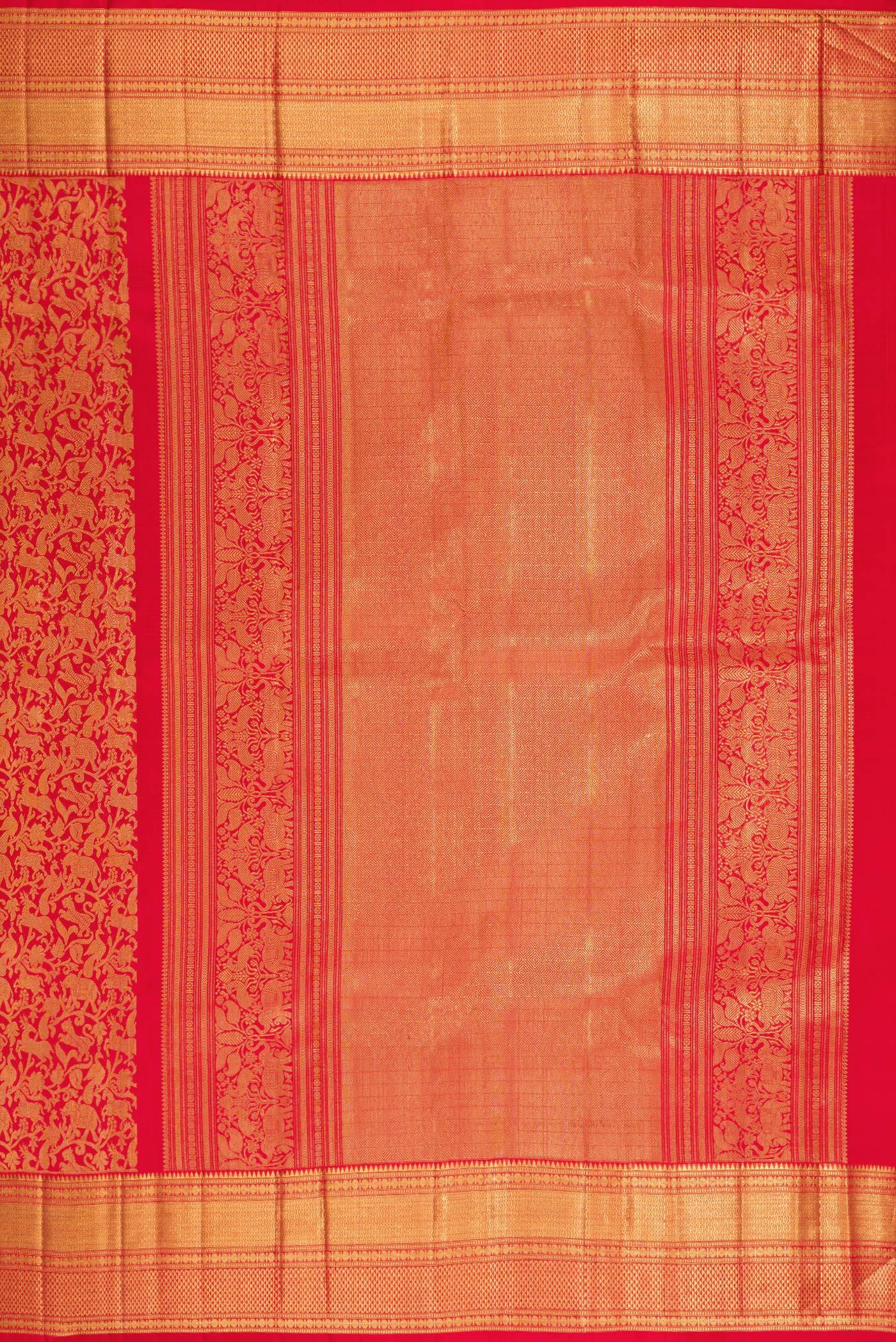 Close up image of the pallu of Red Kanchipuram Silk Saree with Zari Brocade on the body and Zari Border. 