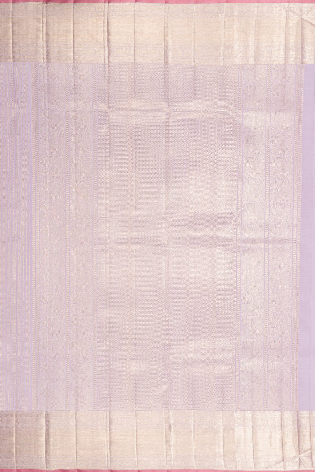 Close up image of the pallu of Lilac Dual Tone Kanchipuram Silk Saree with Zari Brocade on the body and Zari Border. 