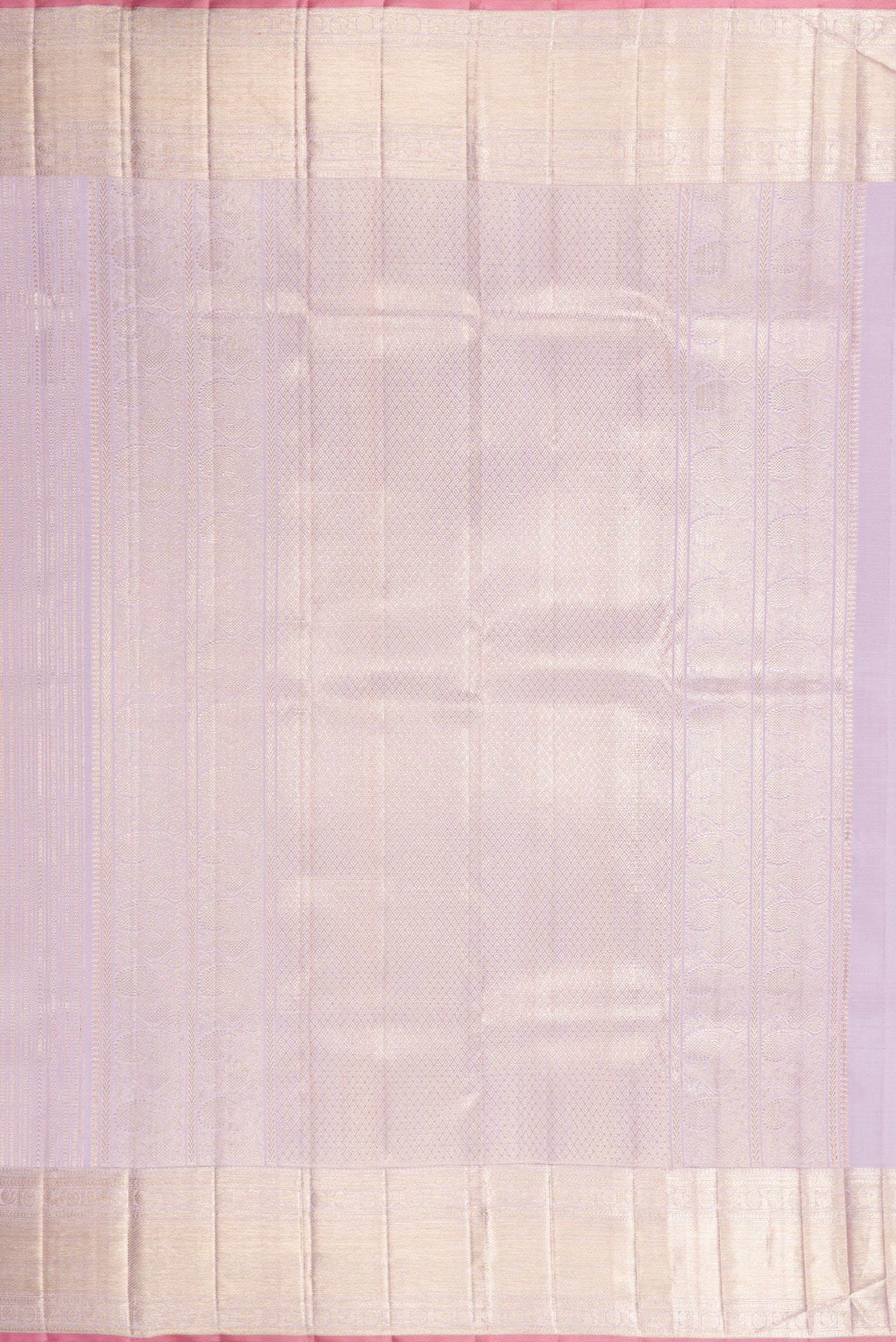 Close up image of the pallu of Lilac Dual Tone Kanchipuram Silk Saree with Zari Brocade on the body and Zari Border. 