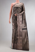 Black Dual Tone Kanchipuram Silk Saree with Zari Brocade on the body and Zari Border.  displayed on a mannequin