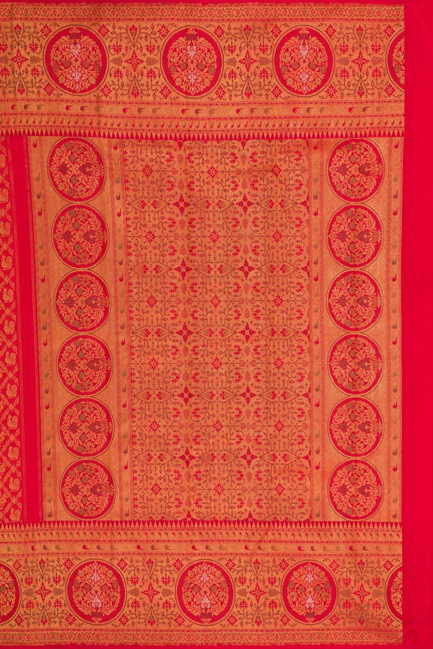 Close up image of the pallu of Red Dual Tone Kanjivaram Silk Saree with Zari Brocade on the body and Zari Border. 