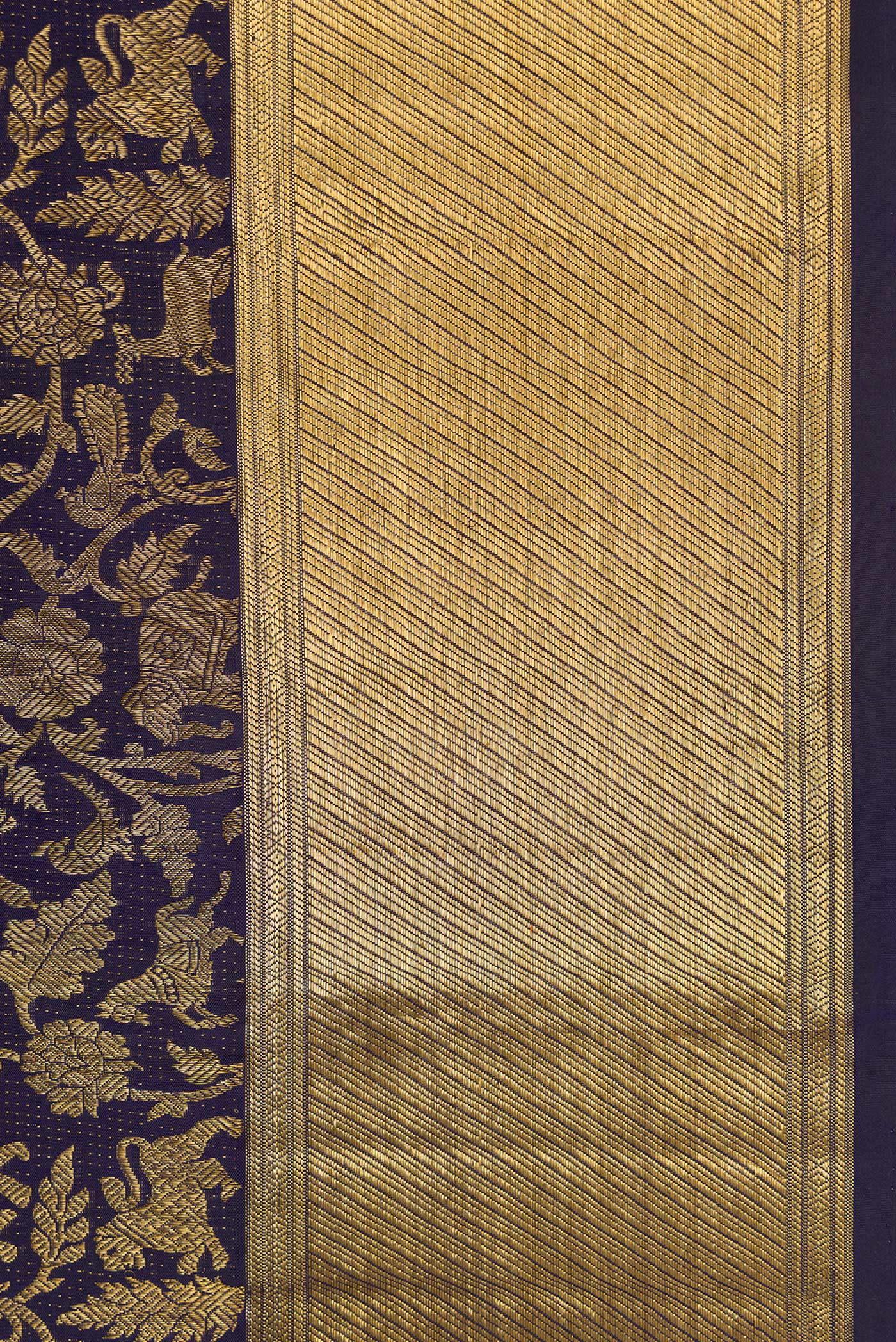 Border image of Navy Blue Dual Tone Kanchipuram Silk Saree with Zari Brocade on the body and Zari Border. 