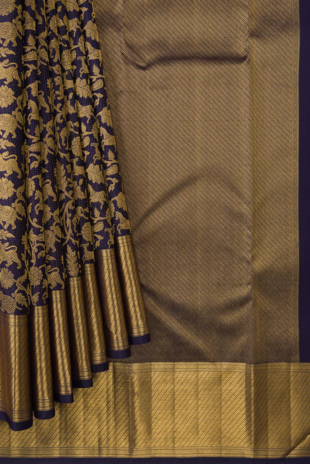 Pleats and pallu of Navy Blue Dual Tone Kanchipuram Silk Saree with Zari Brocade on the body and Zari Border. 