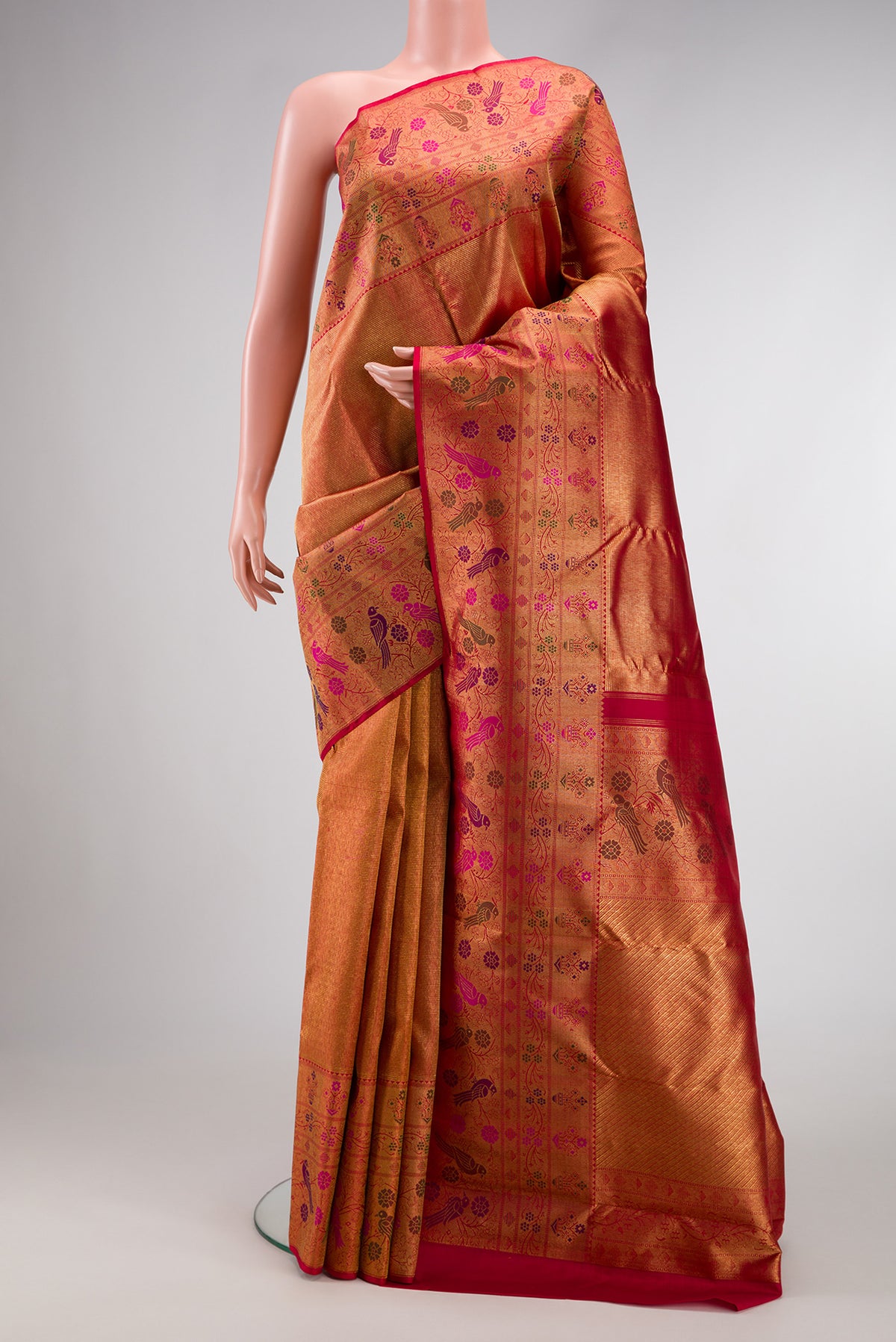 Dark Pink Dual Tone Kanjivaram Silk Saree with Zari Brocade on the body and Fancy Border.  displayed on a mannequin