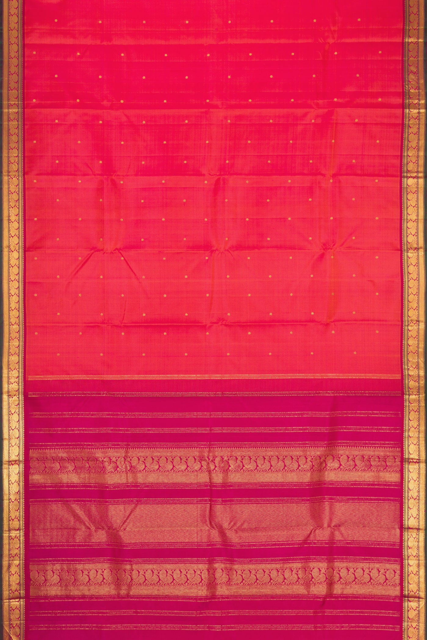 Flat view of Coral Dual Tone Kanjivaram Silk Saree with Zari Butta on the body and Zari Border. 