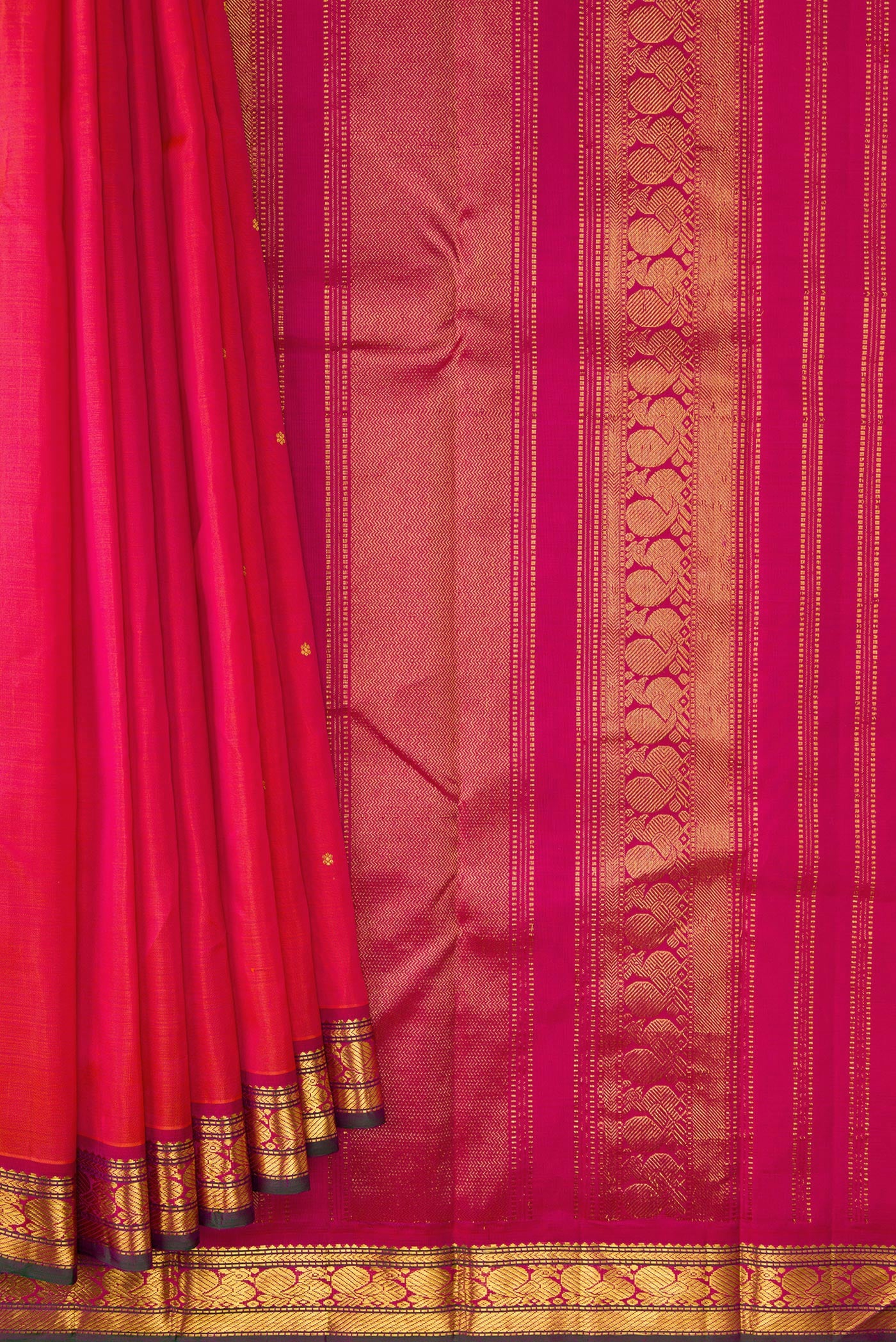 Pleats and pallu of Coral Dual Tone Kanjivaram Silk Saree with Zari Butta on the body and Zari Border. 