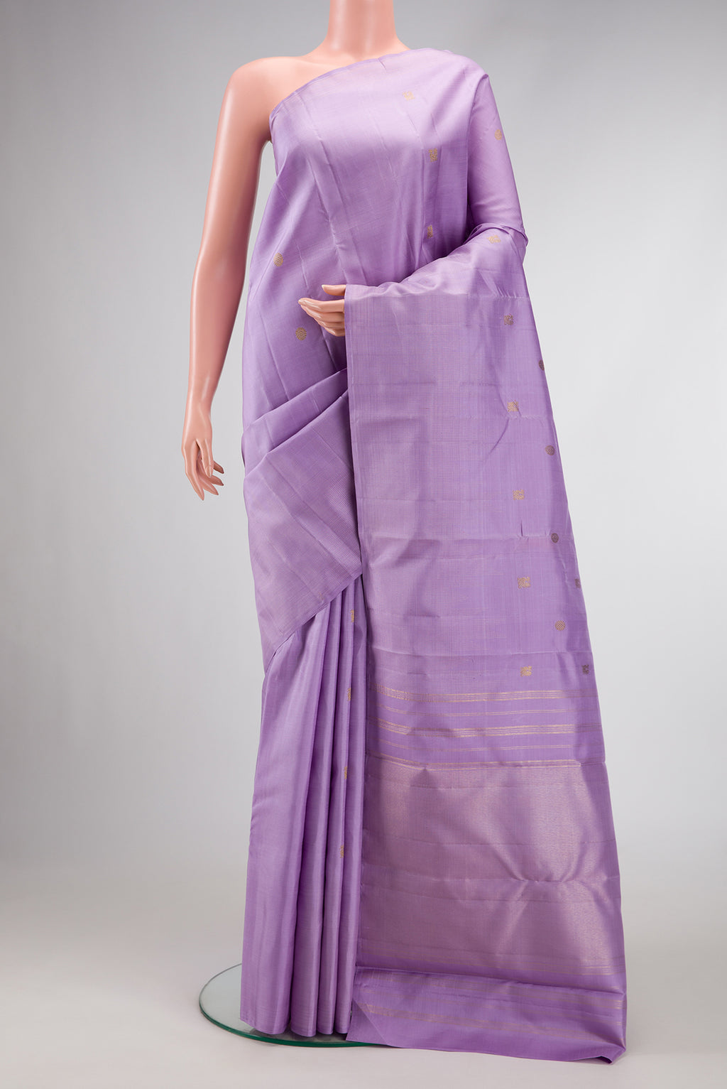 Pure Silk Pure Zari Lavender Dual Tone Kanchipuram Saree with Zari Butta on the body and Temple Border.  displayed on a mannequin