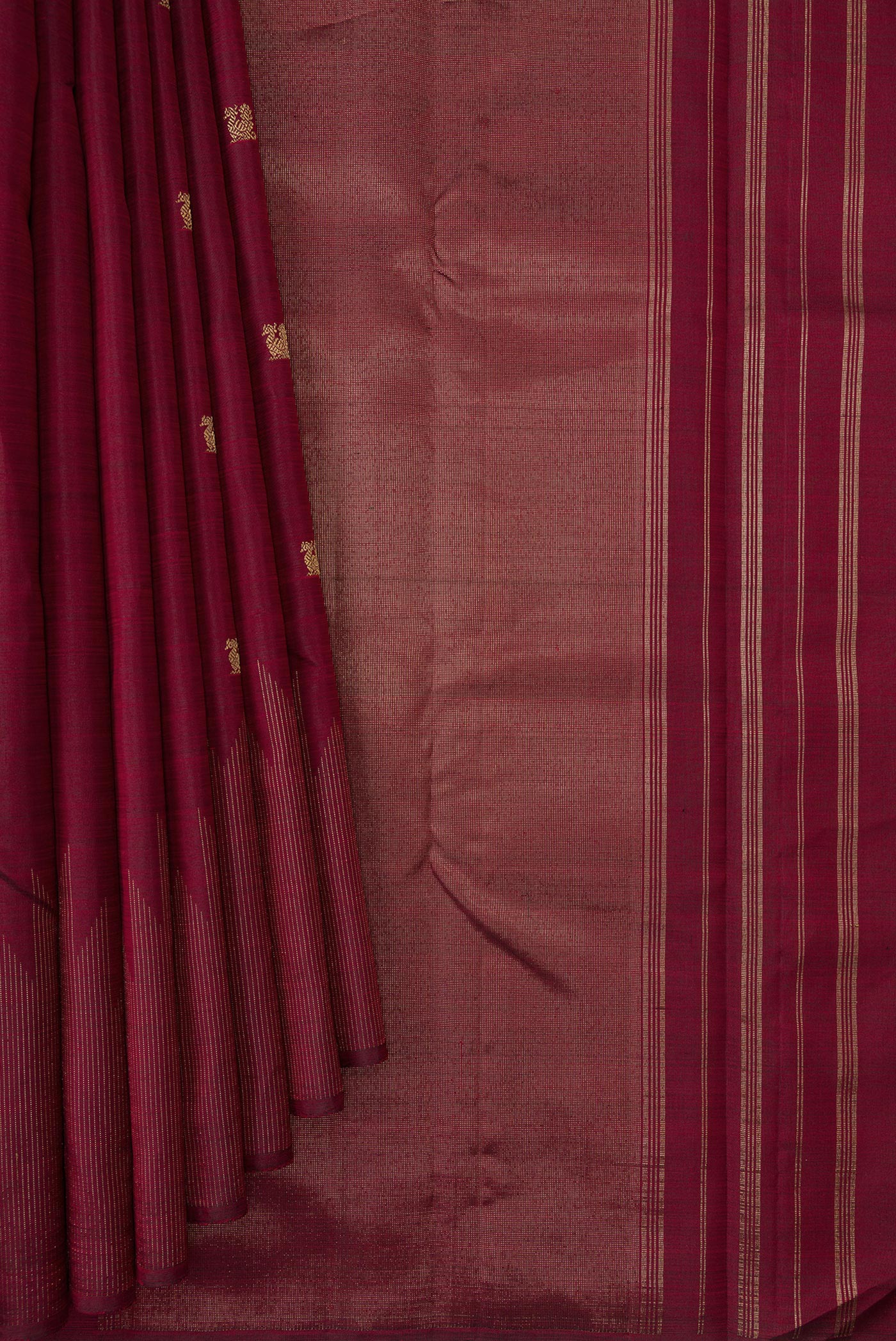 Pleats and pallu of Pure Silk Pure Zari Maroon Dual Tone Kanchipuram Saree with Zari Butta on the body and Zari Border. 