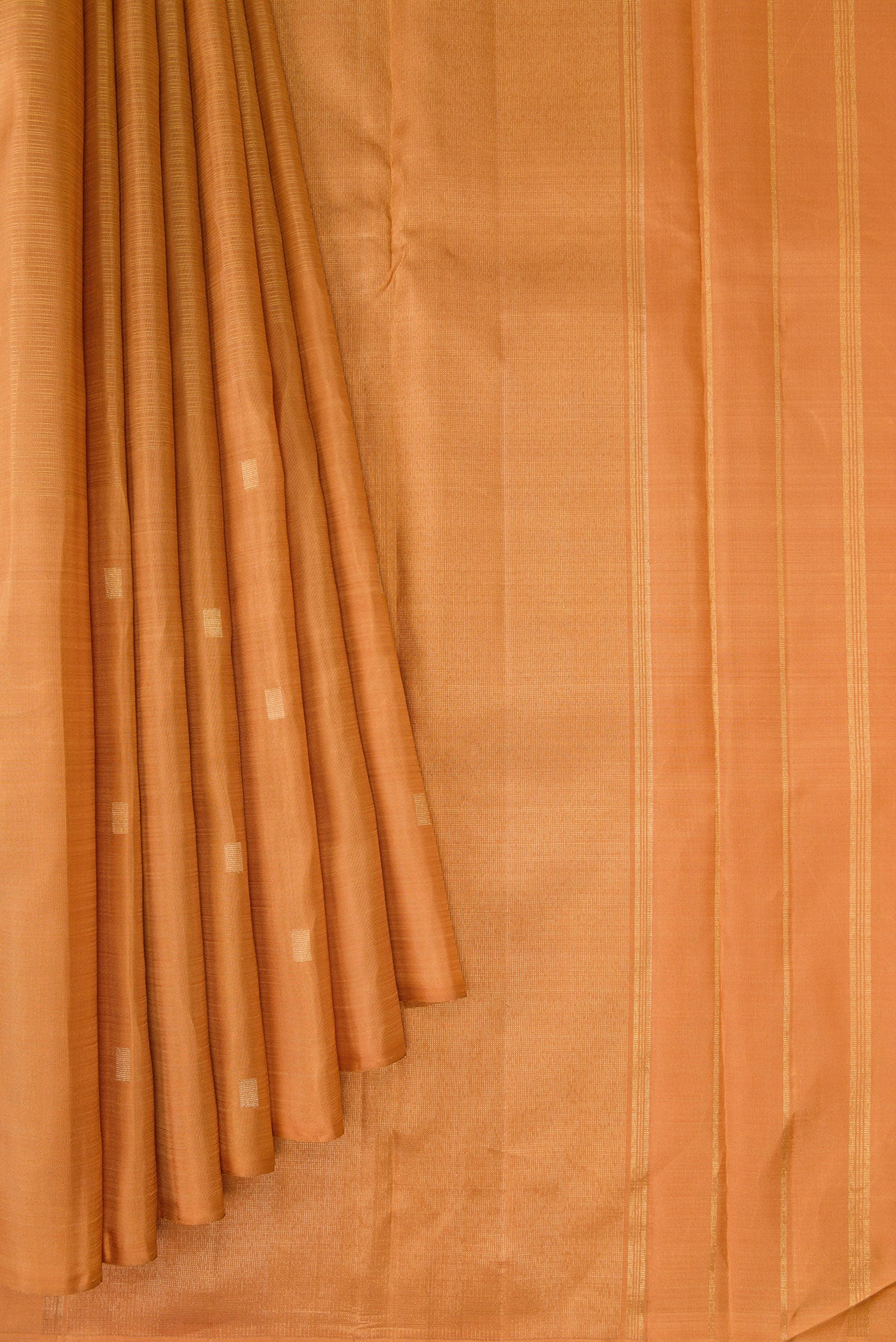 Pleats and pallu of Pure Silk Pure Zari Golden Dual Tone Kanchipuram Saree with Zari Butta on the body and Without Border. 