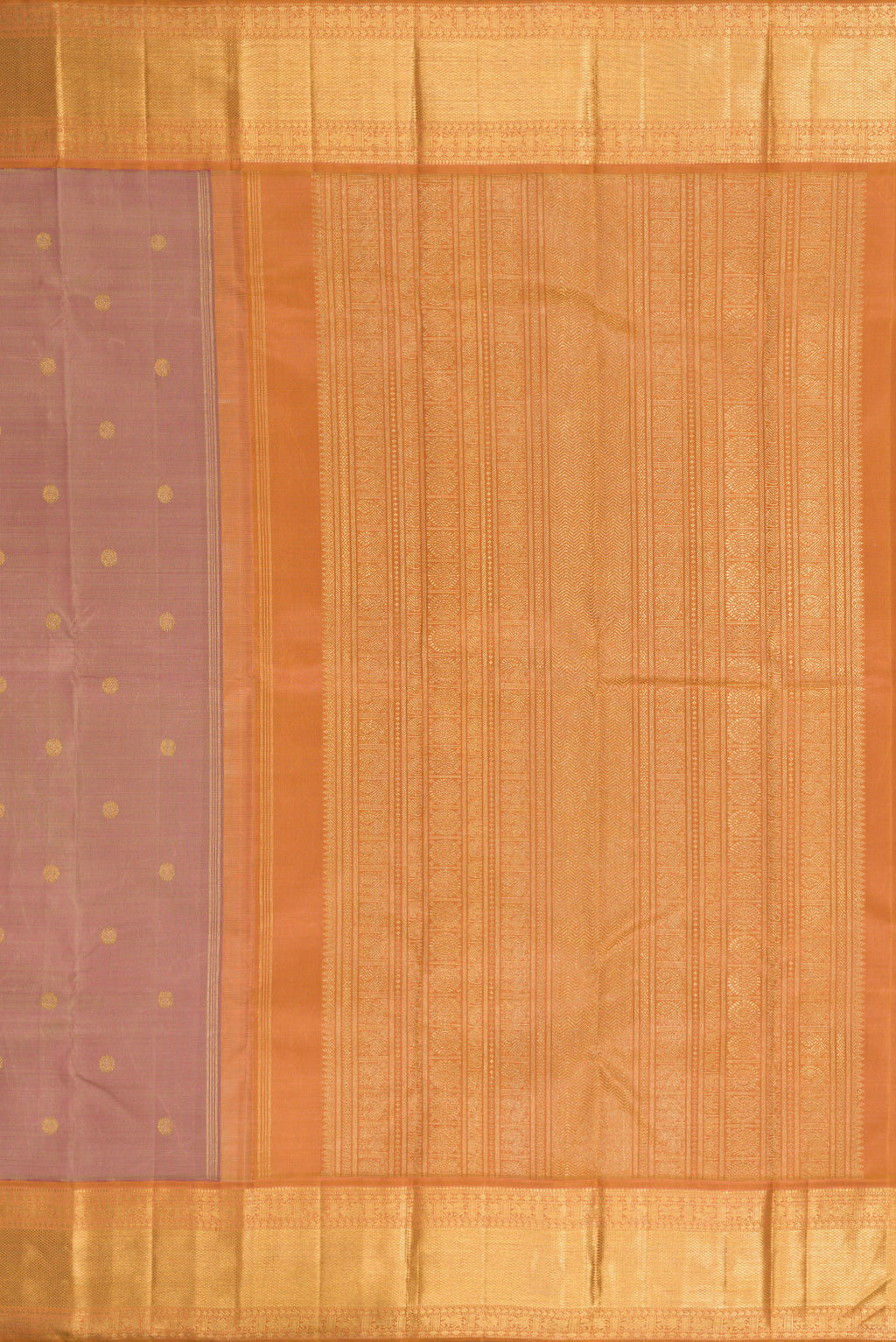 Close up image of the pallu of Pure Silk Pure Zari Rose Gold Kanjivaram Saree with Zari Butta on the body and Zari Border. 