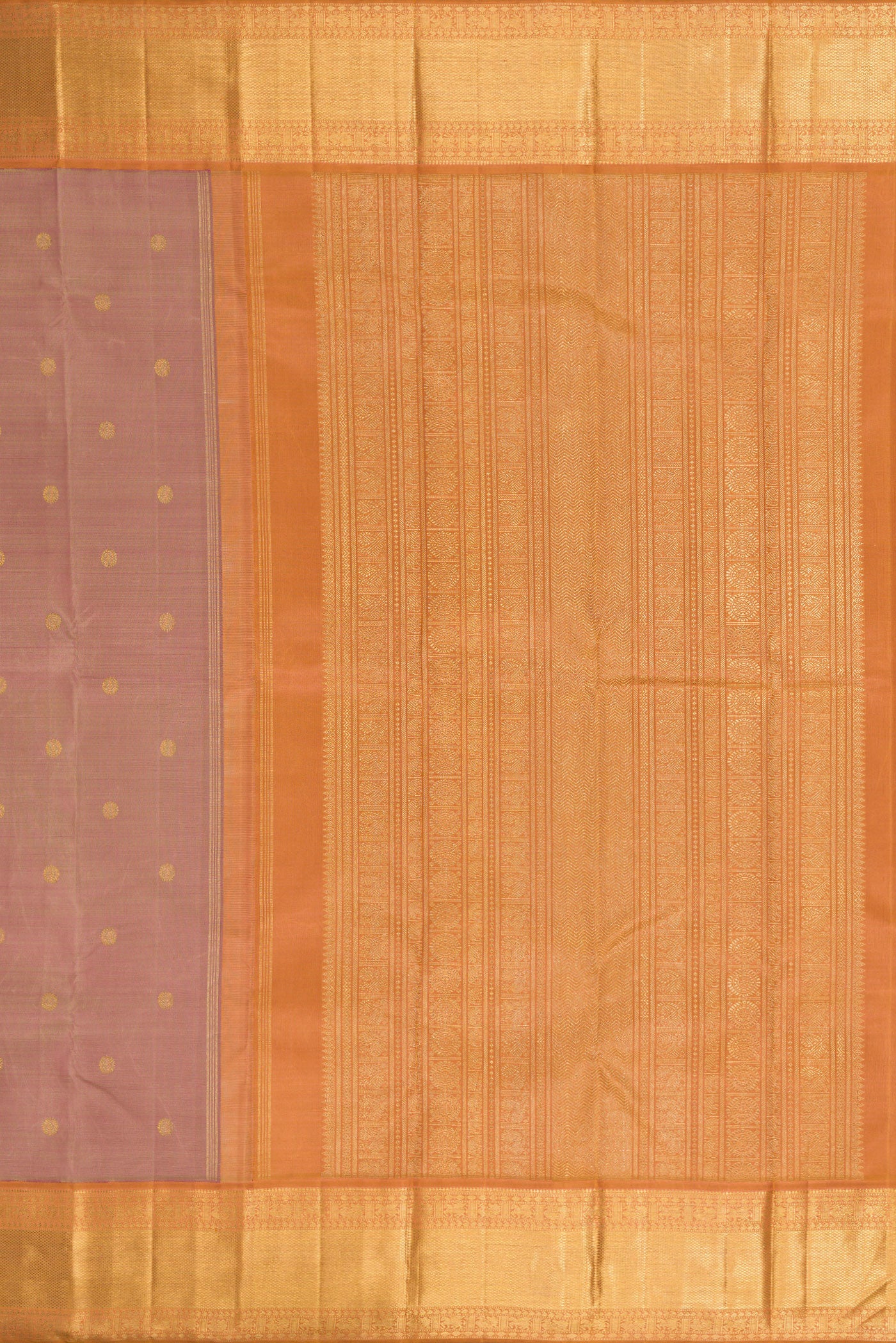 Close up image of the pallu of Pure Silk Pure Zari Rose Gold Kanjivaram Saree with Zari Butta on the body and Zari Border. 