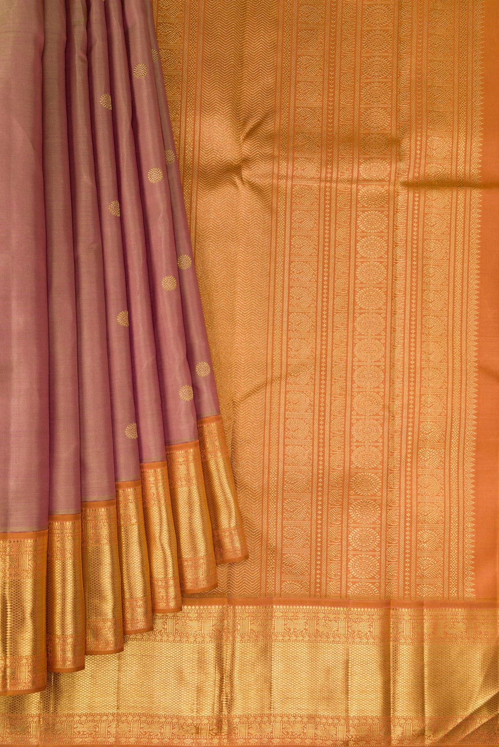 Pleats and pallu of Pure Silk Pure Zari Rose Gold Kanjivaram Saree with Zari Butta on the body and Zari Border. 
