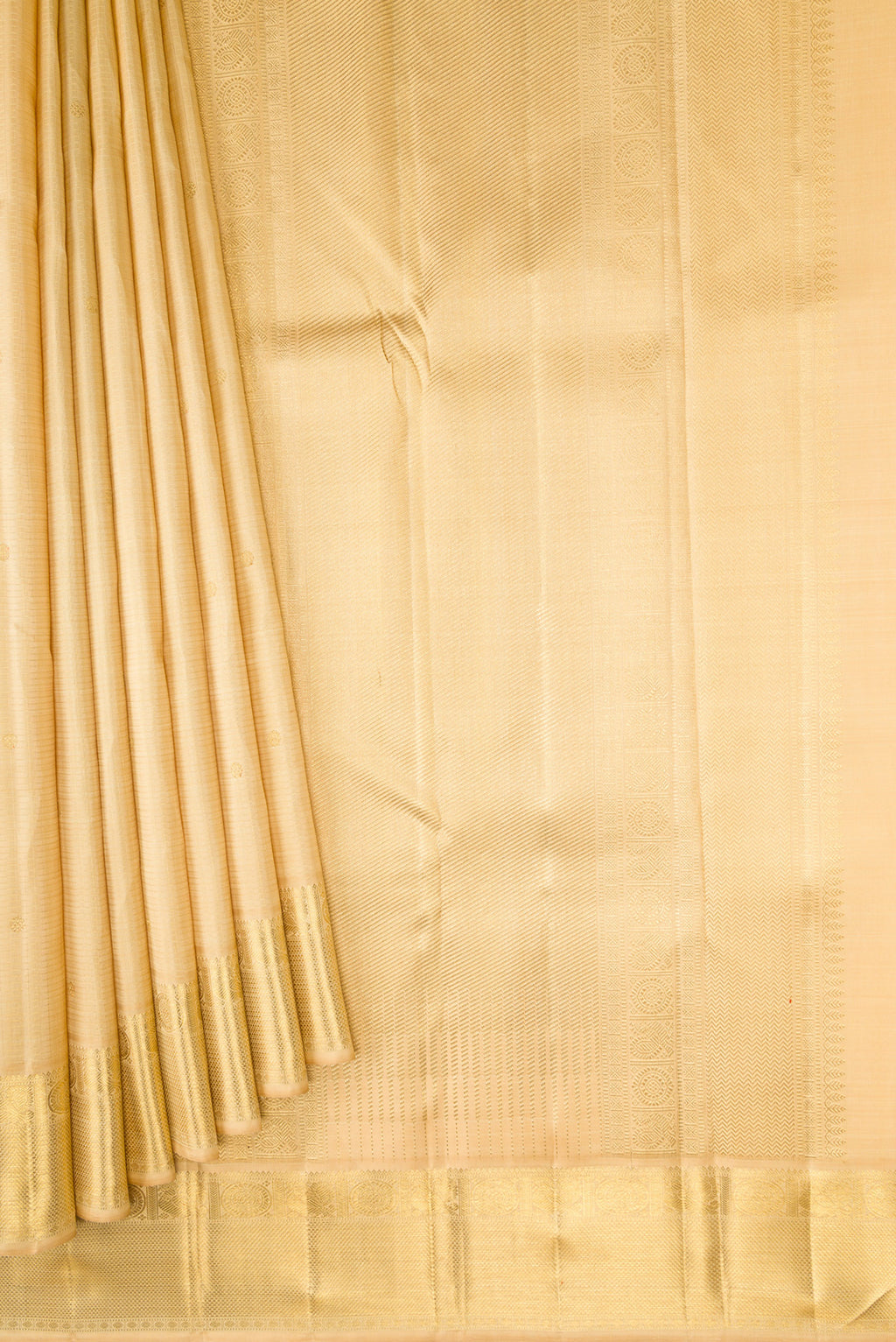 Pleats and pallu of Pure Silk Pure Zari Sandal Dual Tone Kanjivaram Saree with Zari Butta on the body and Zari Border. 