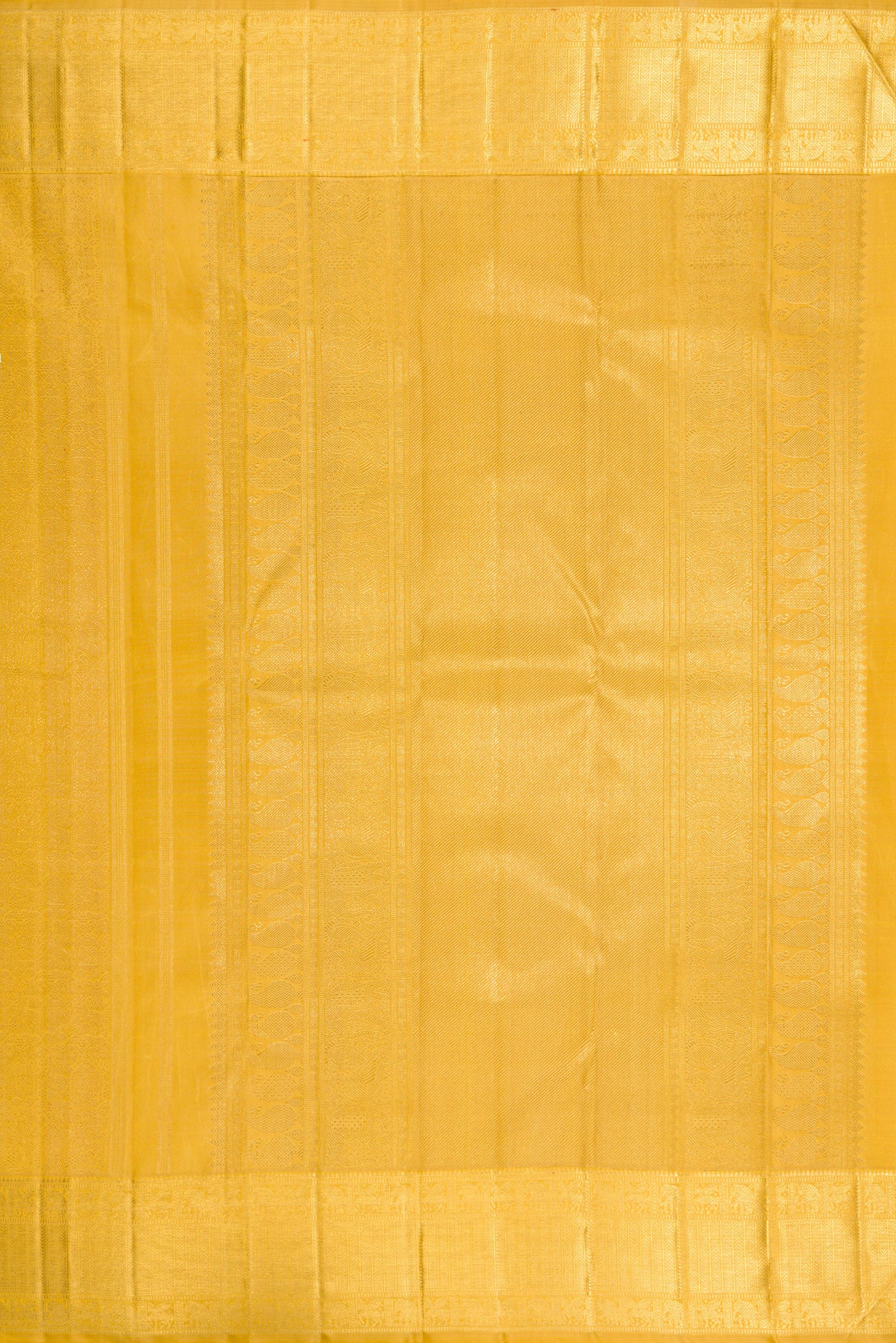 Close up image of the pallu of Pure Silk Pure Zari Mustard Dual Tone Kanjivaram Saree with Zari Brocade on the body and Zari Border. 