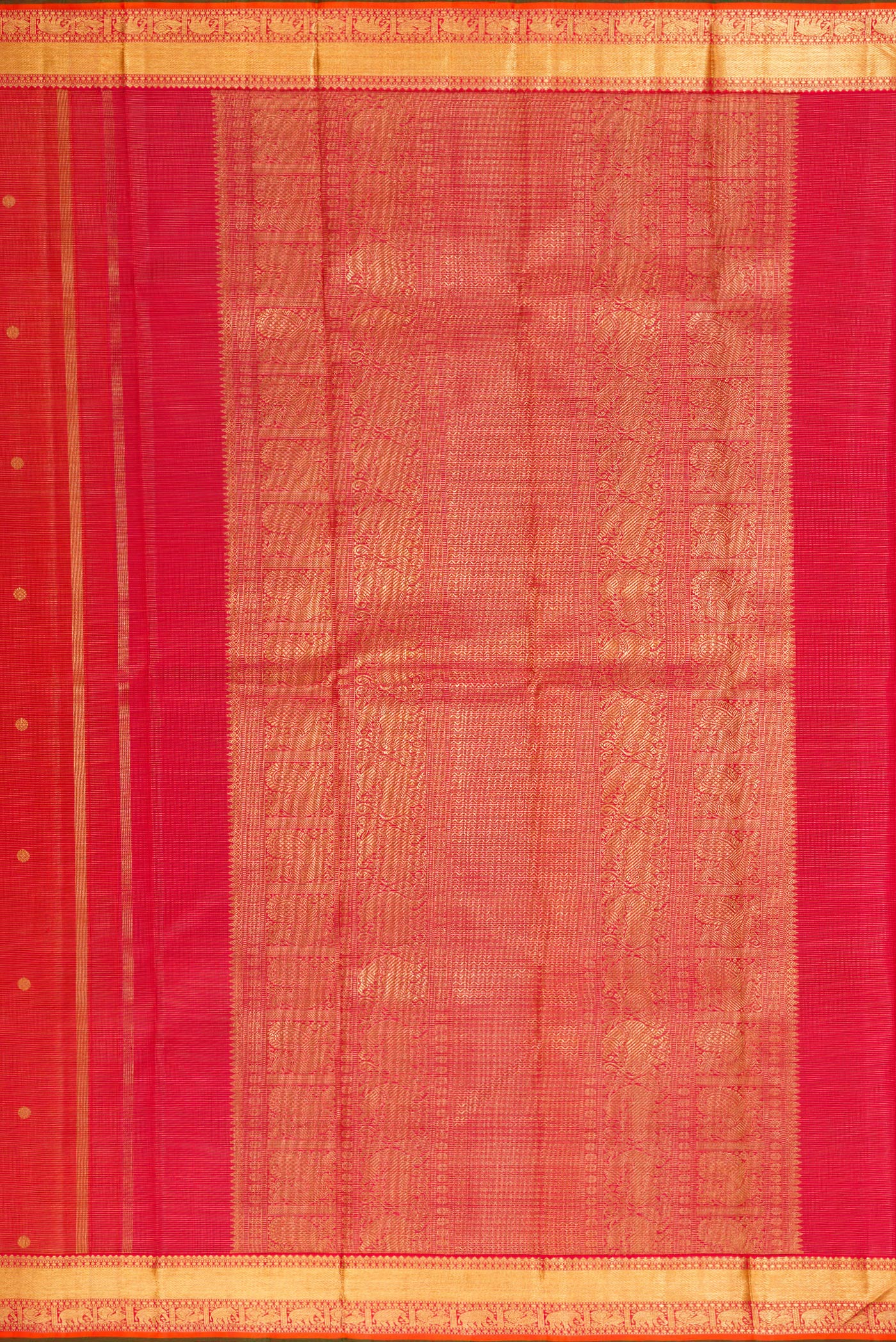Close up image of the pallu of Pure Silk Pure Zari Brick Orange Dual Tone Kanjivaram Saree with Stripes on the body and Zari Border. 