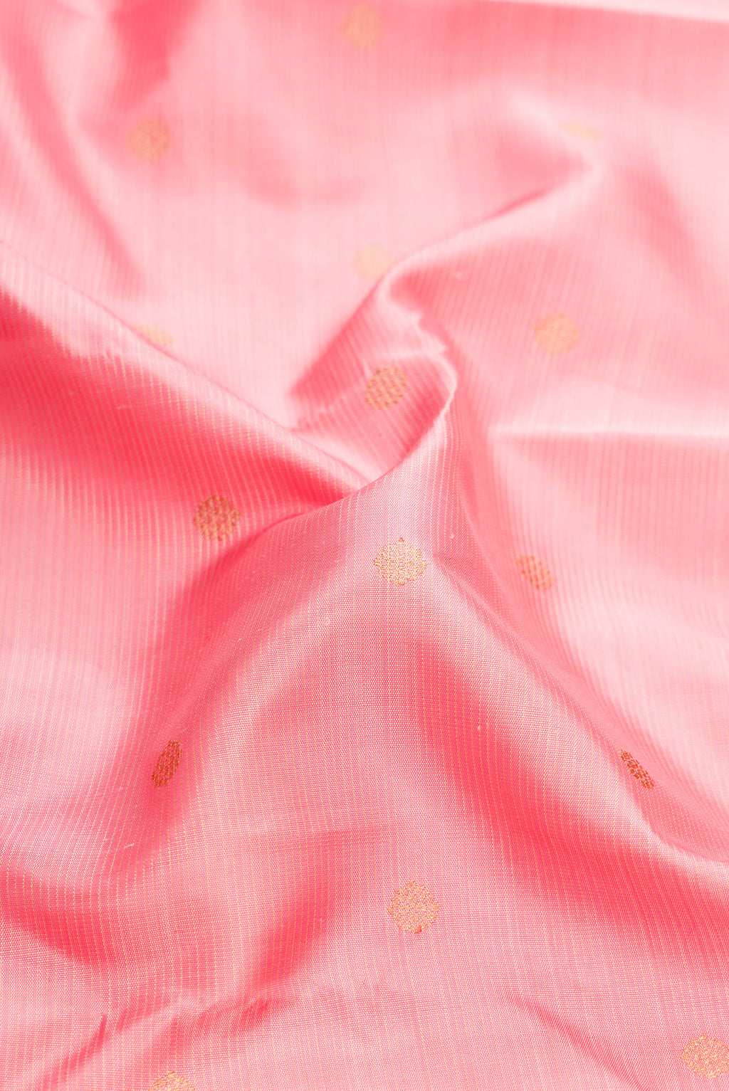 Close up of Pure Silk Pure Zari Pink Dual Tone Kanjivaram Saree with Stripes on the body and Zari Border.  displaying folds