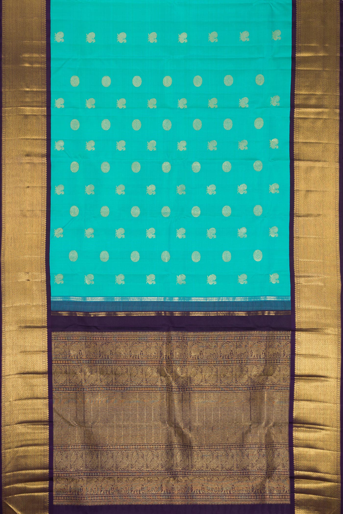 Flat view of Pure Silk Pure Zari Sky Blue Dual Tone Kanjivaram Saree with Zari Butta on the body and Zari Border. 