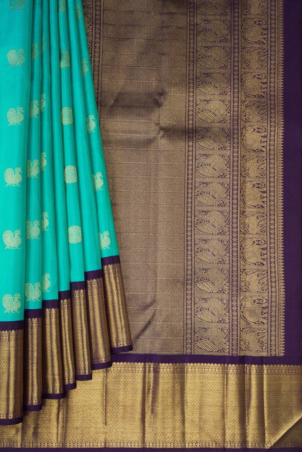 Pleats and pallu of Pure Silk Pure Zari Sky Blue Dual Tone Kanjivaram Saree with Zari Butta on the body and Zari Border. 